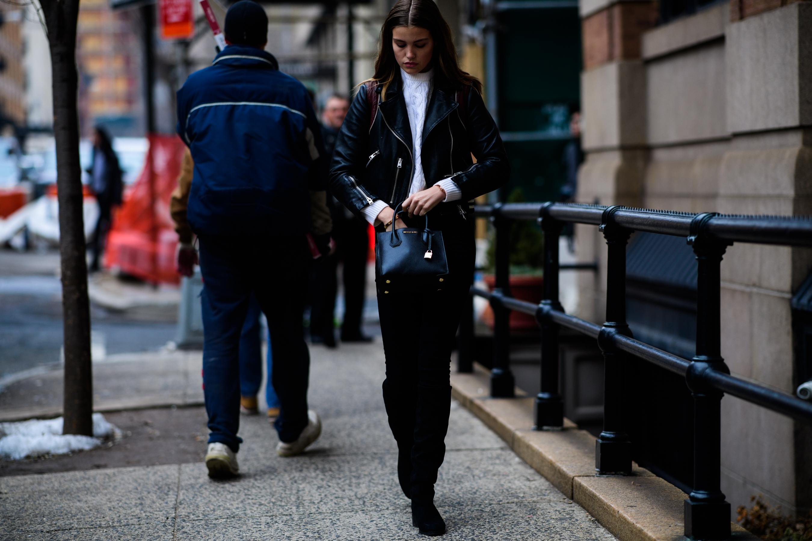 Model wearing black and white clothes