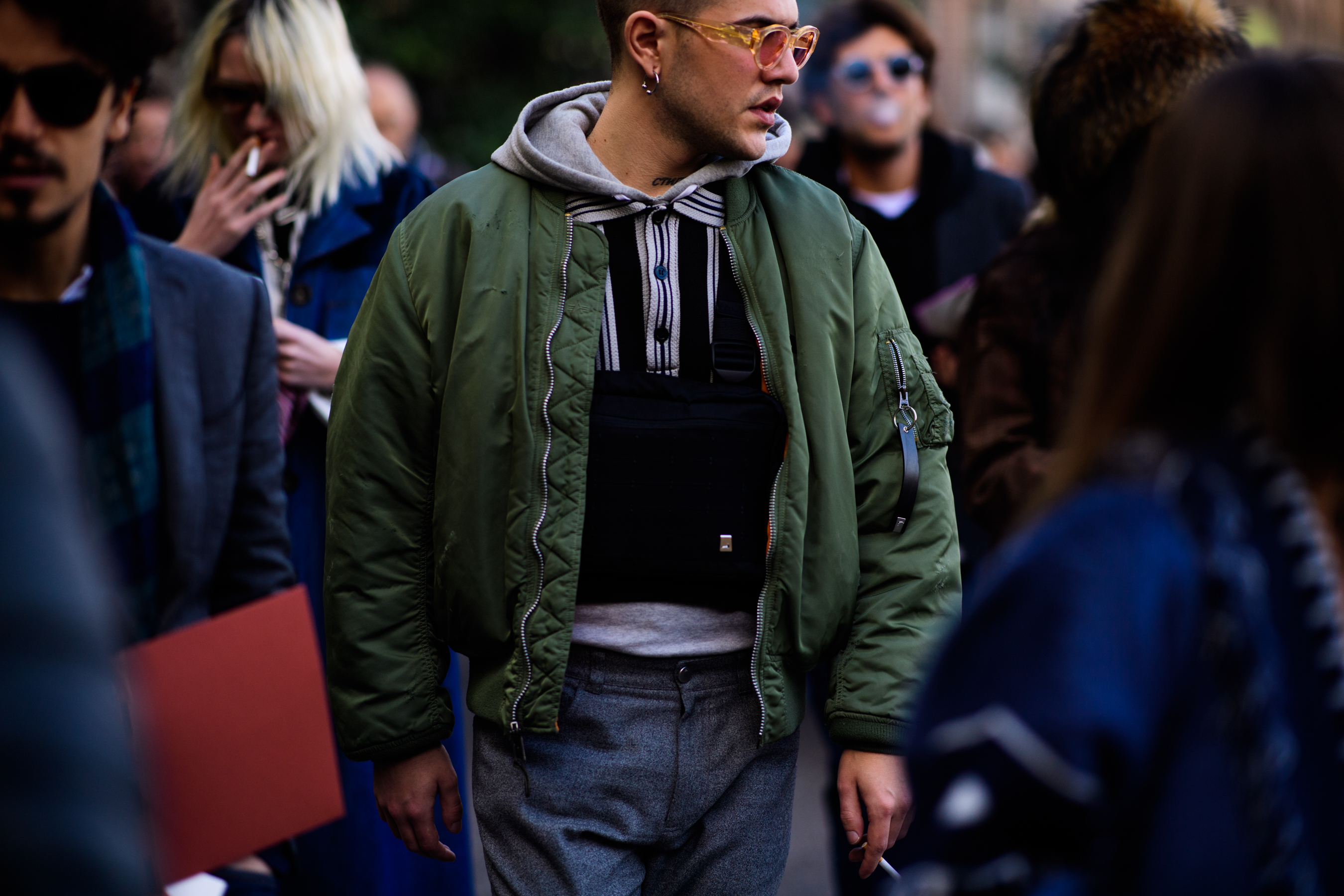 032C fashion editor wearing green bomber