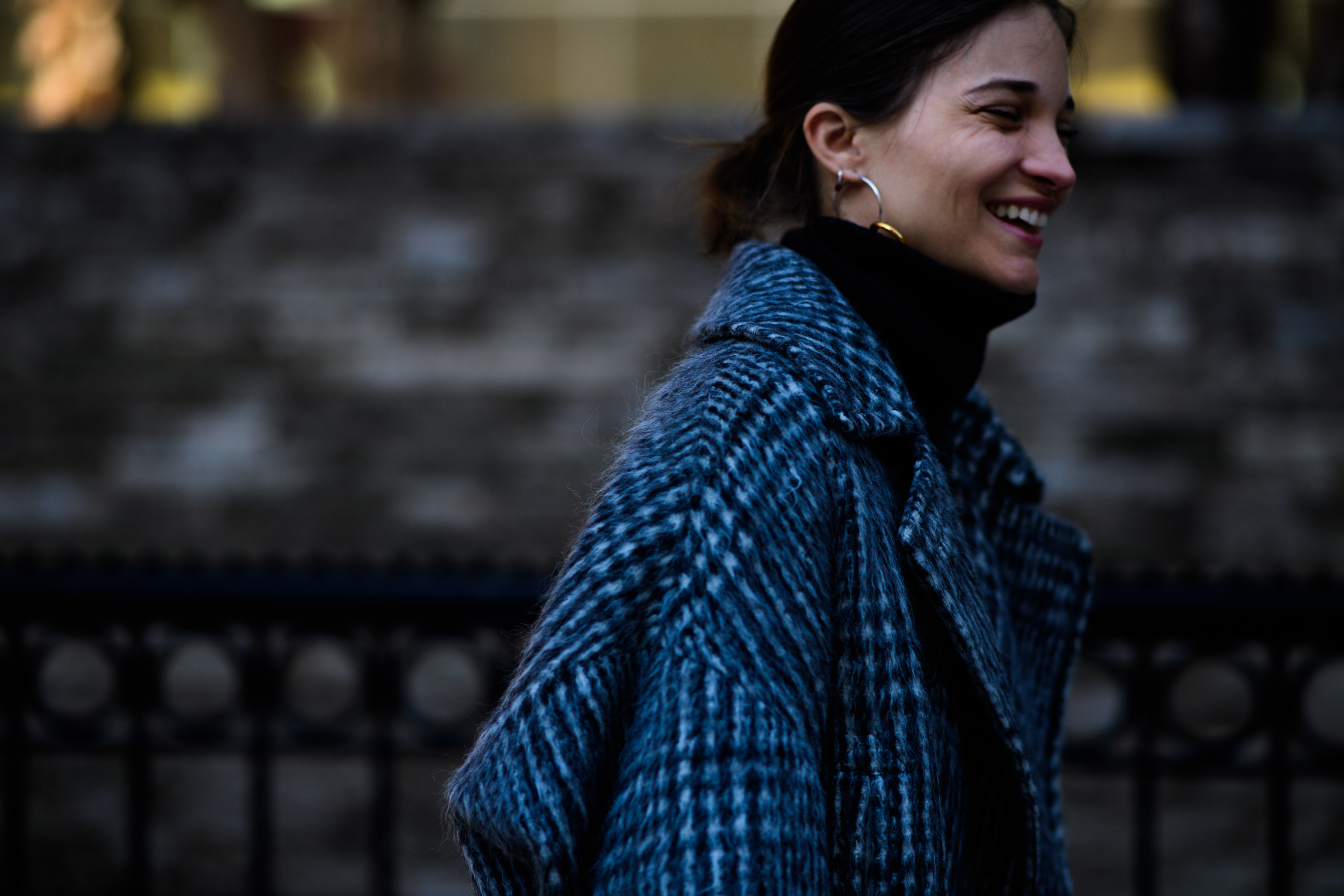 Woman wearing grey coat