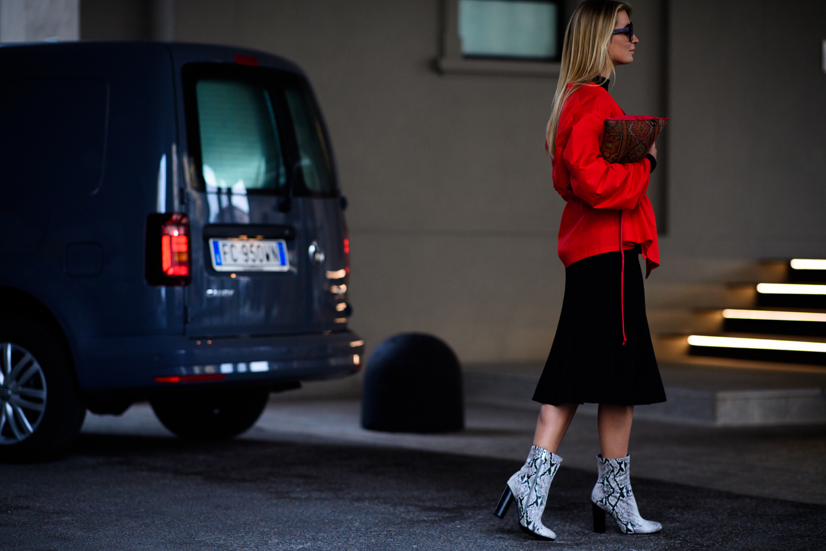 Russian stylist wearing snake skin ankle boots