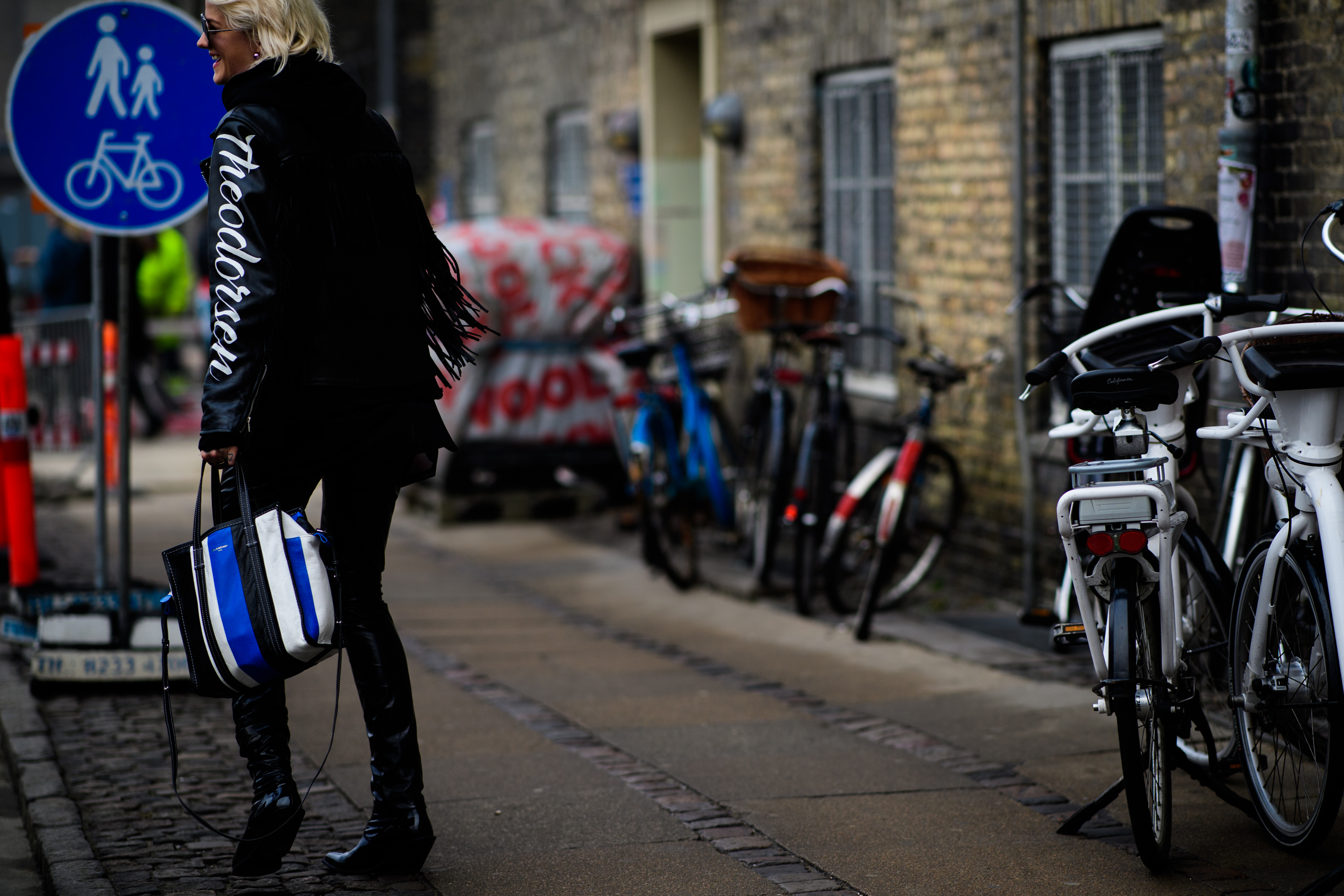 Woman wearing Balenciaga bag