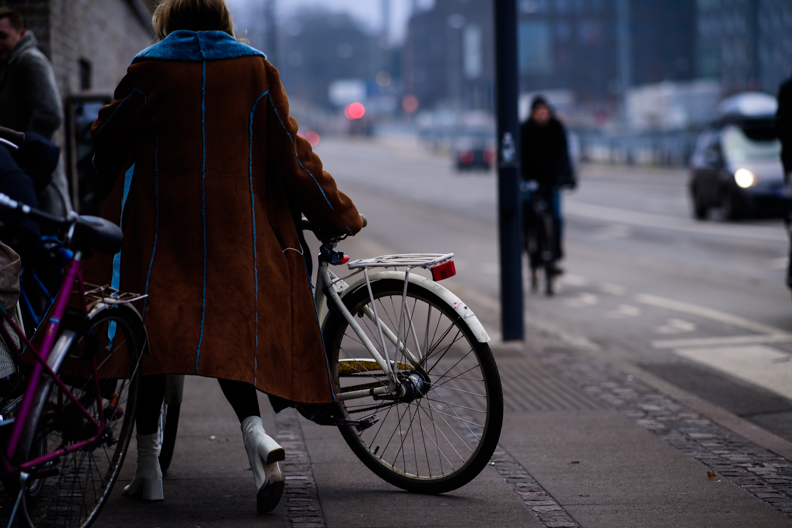 Woman wearing brown coat