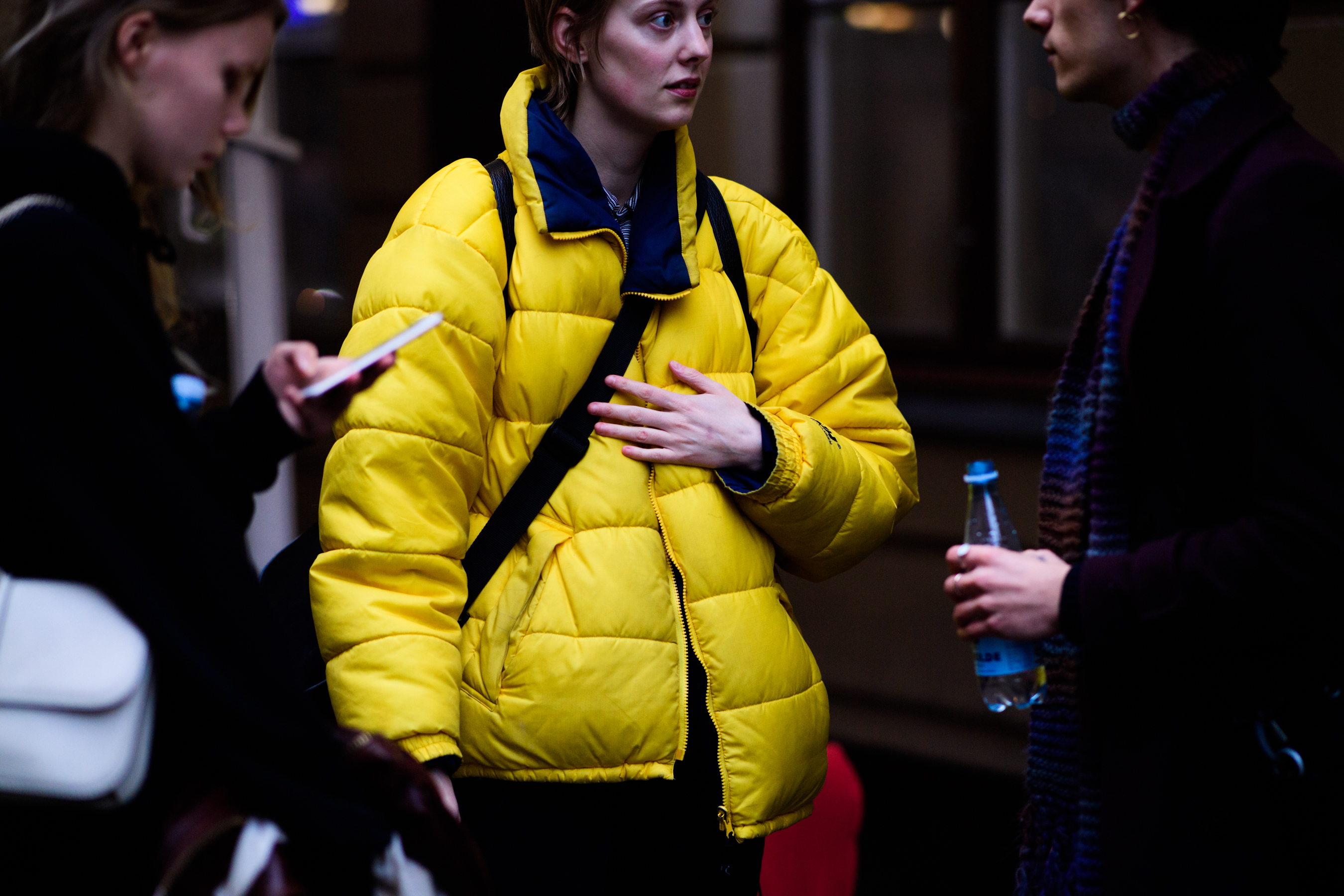 Woman wearing yellow jacket