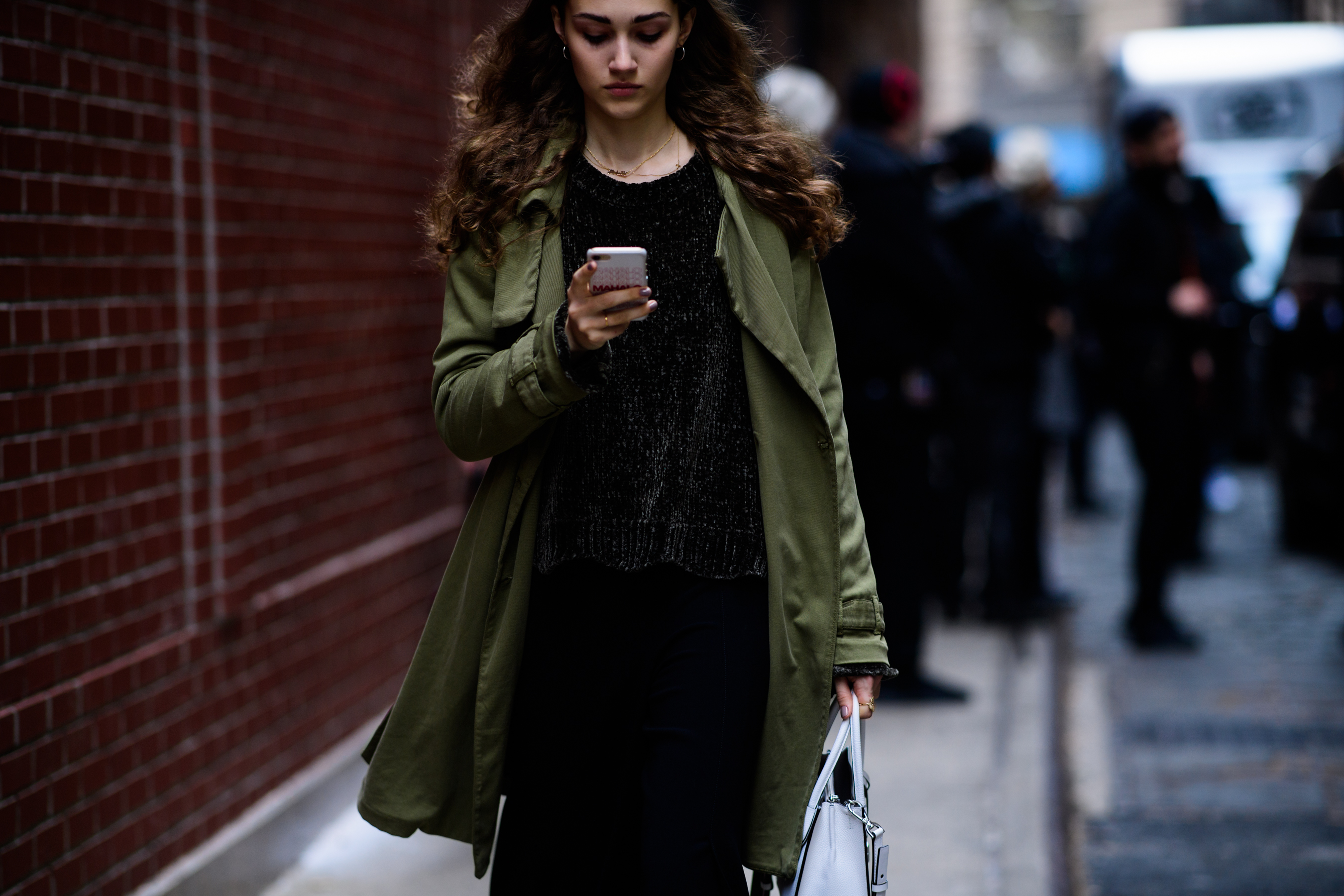 Model wearing green and black
