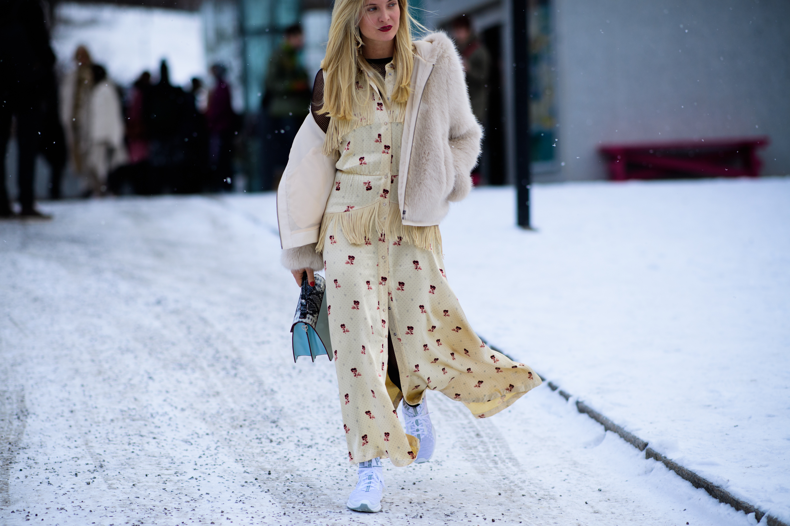 Woman wearing white shoes