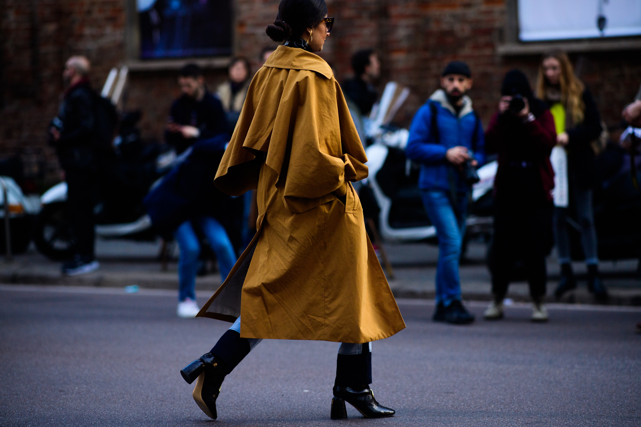 Woman wearing brown cloak