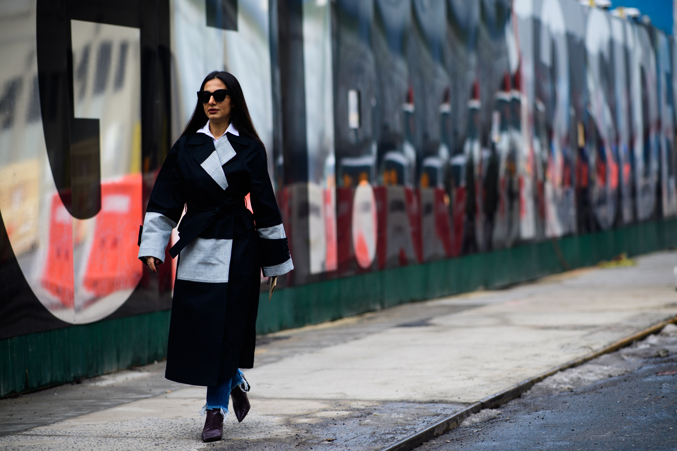 Woman wearing white and black coat