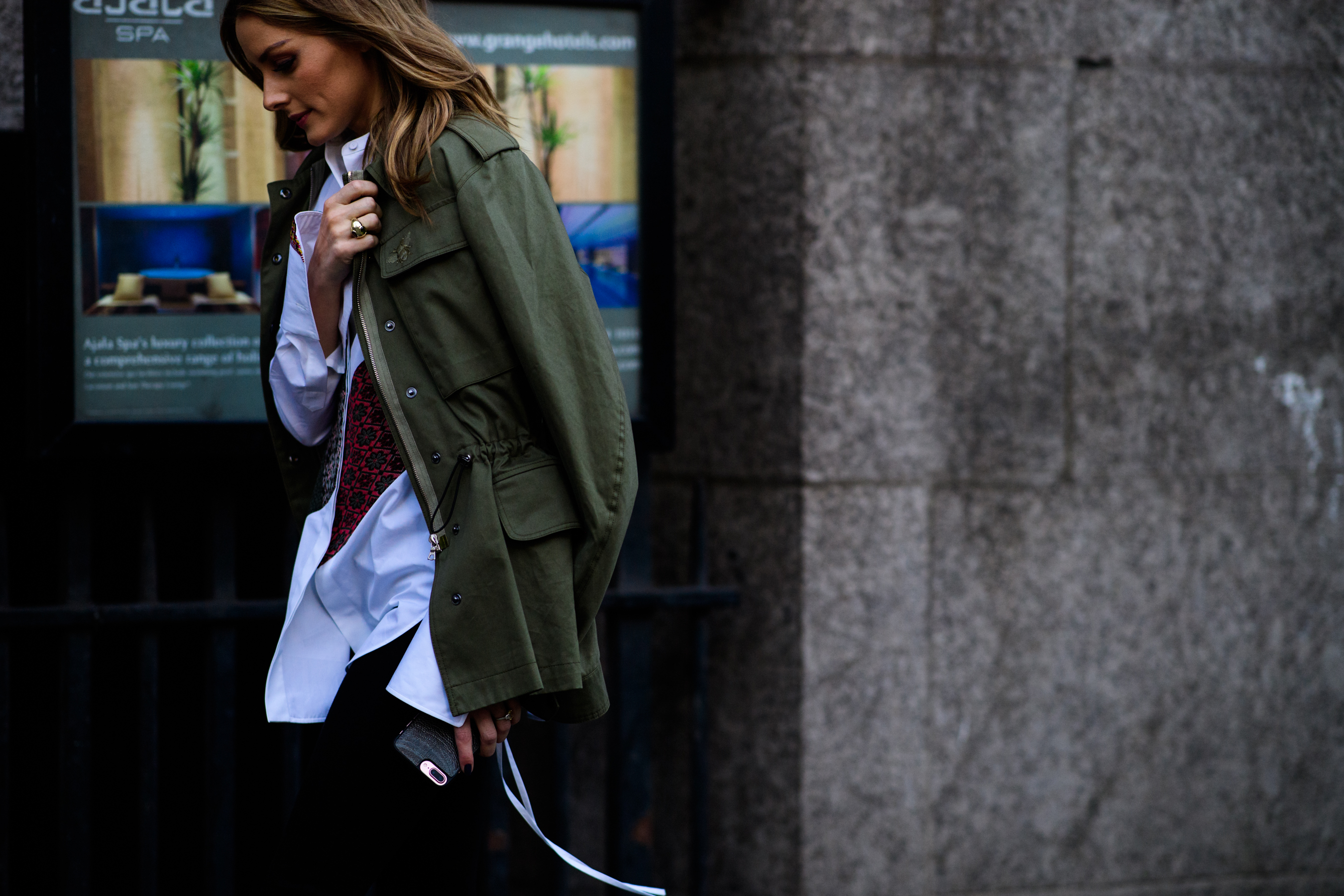 Woman wearing green jacket
