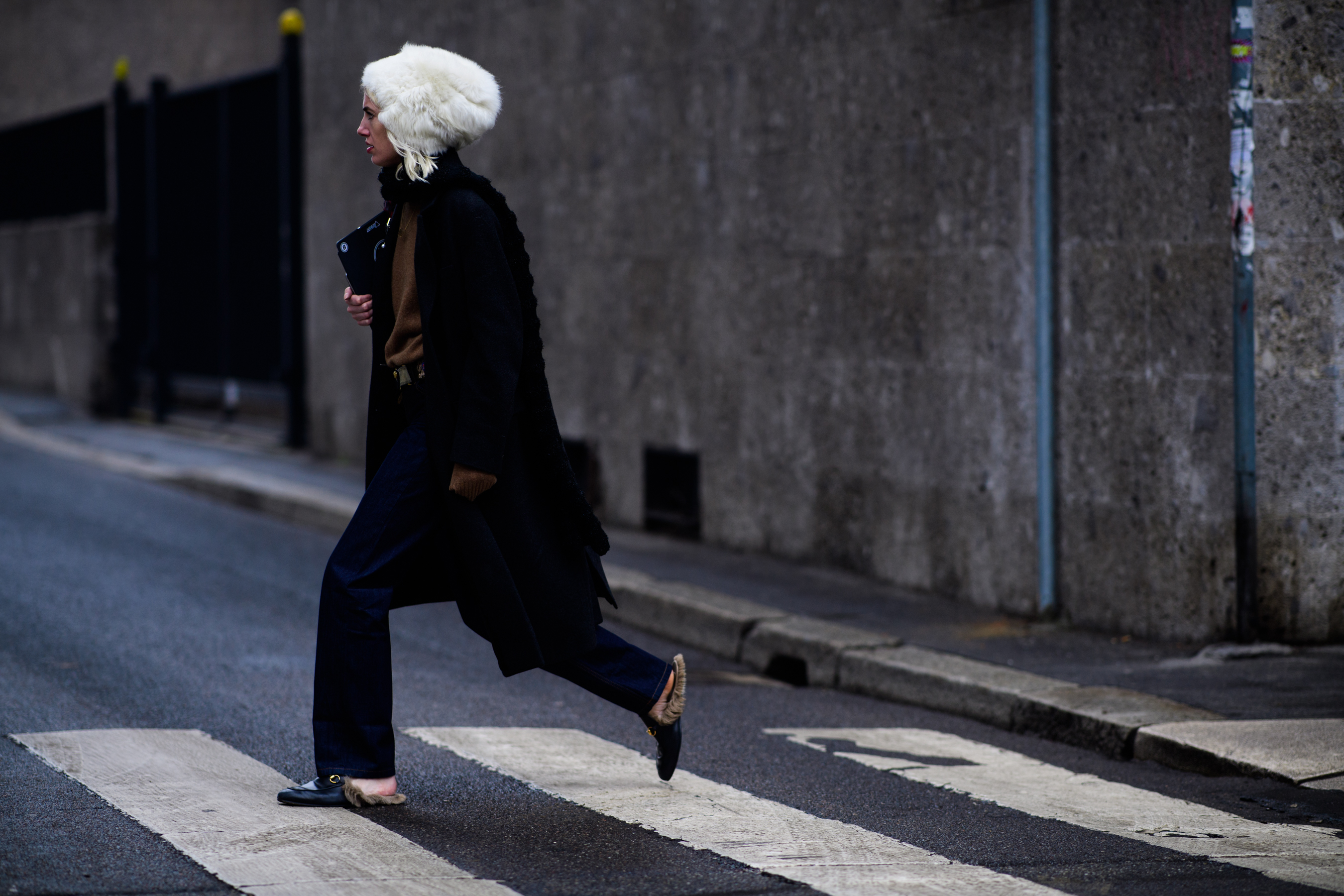 Woman wearing Gucci shoes