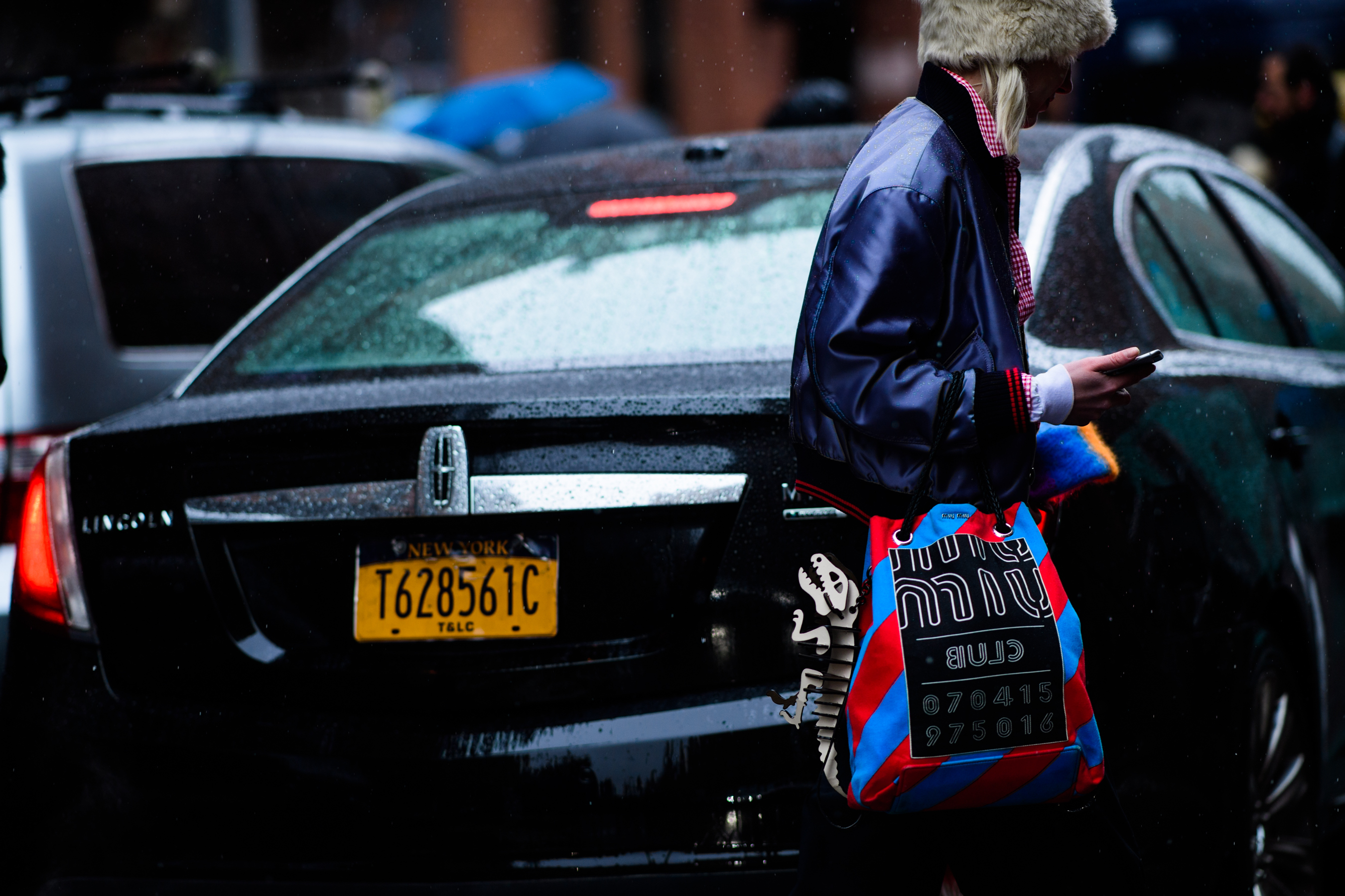 Fashion director with Miu Miu bag