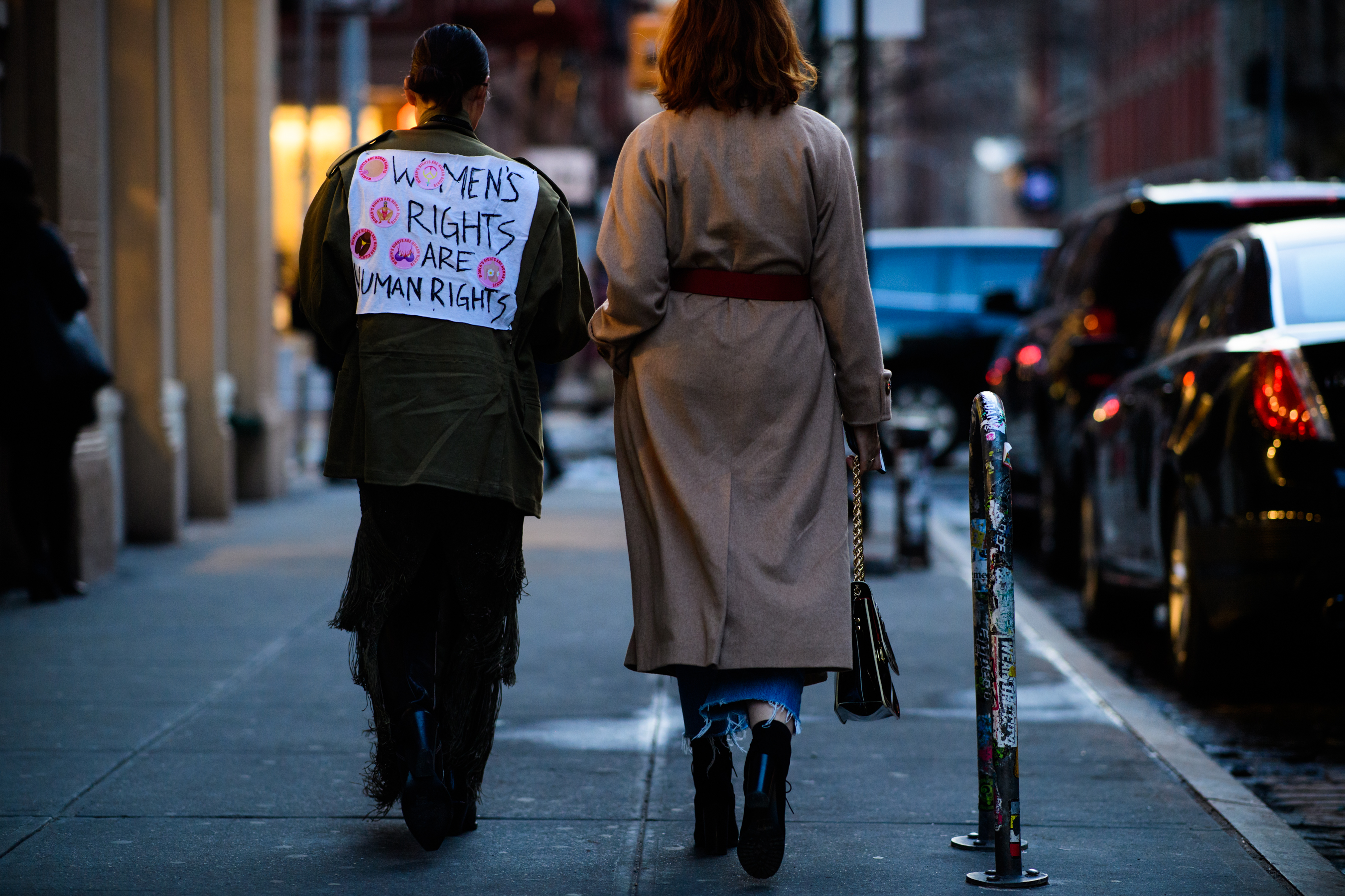 Woman wearing Women's right are human rights jacket