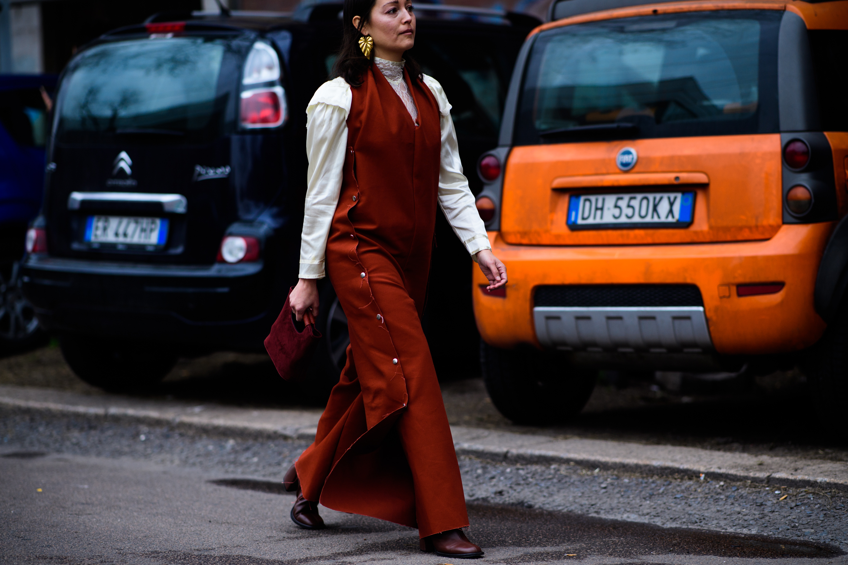 Woman wearing brown overalls
