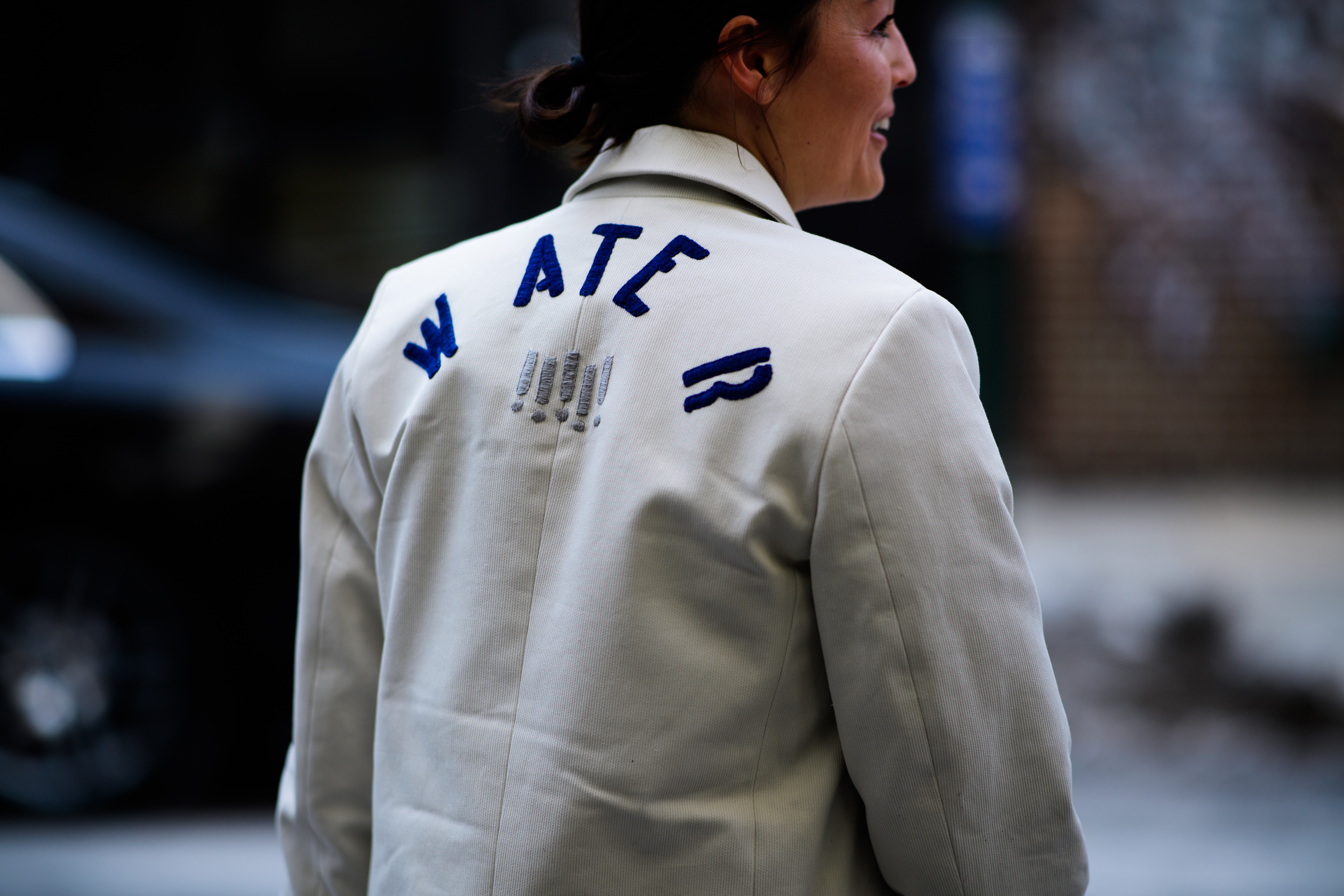 Editor wearing white coat