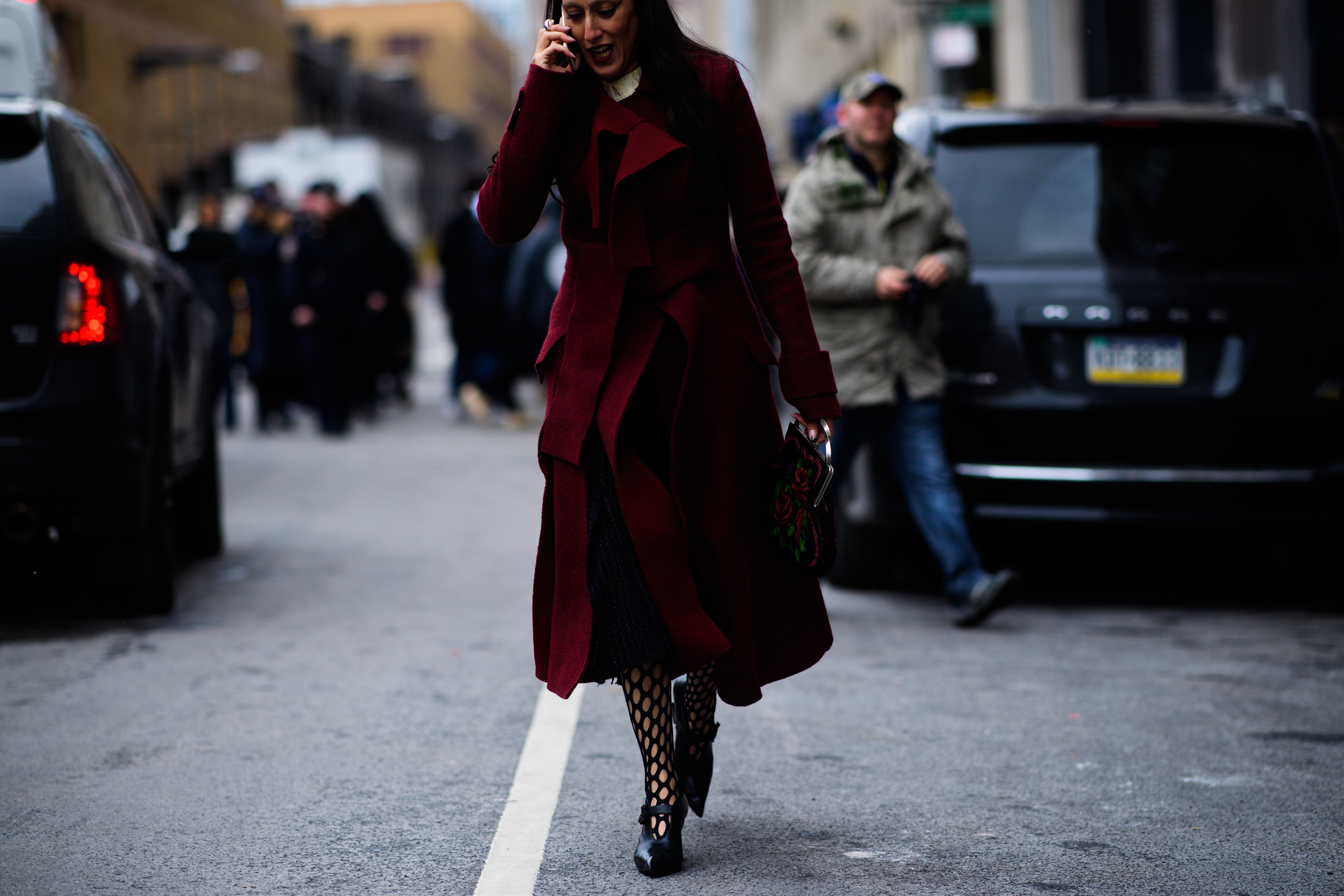 Woman wearing long red coat
