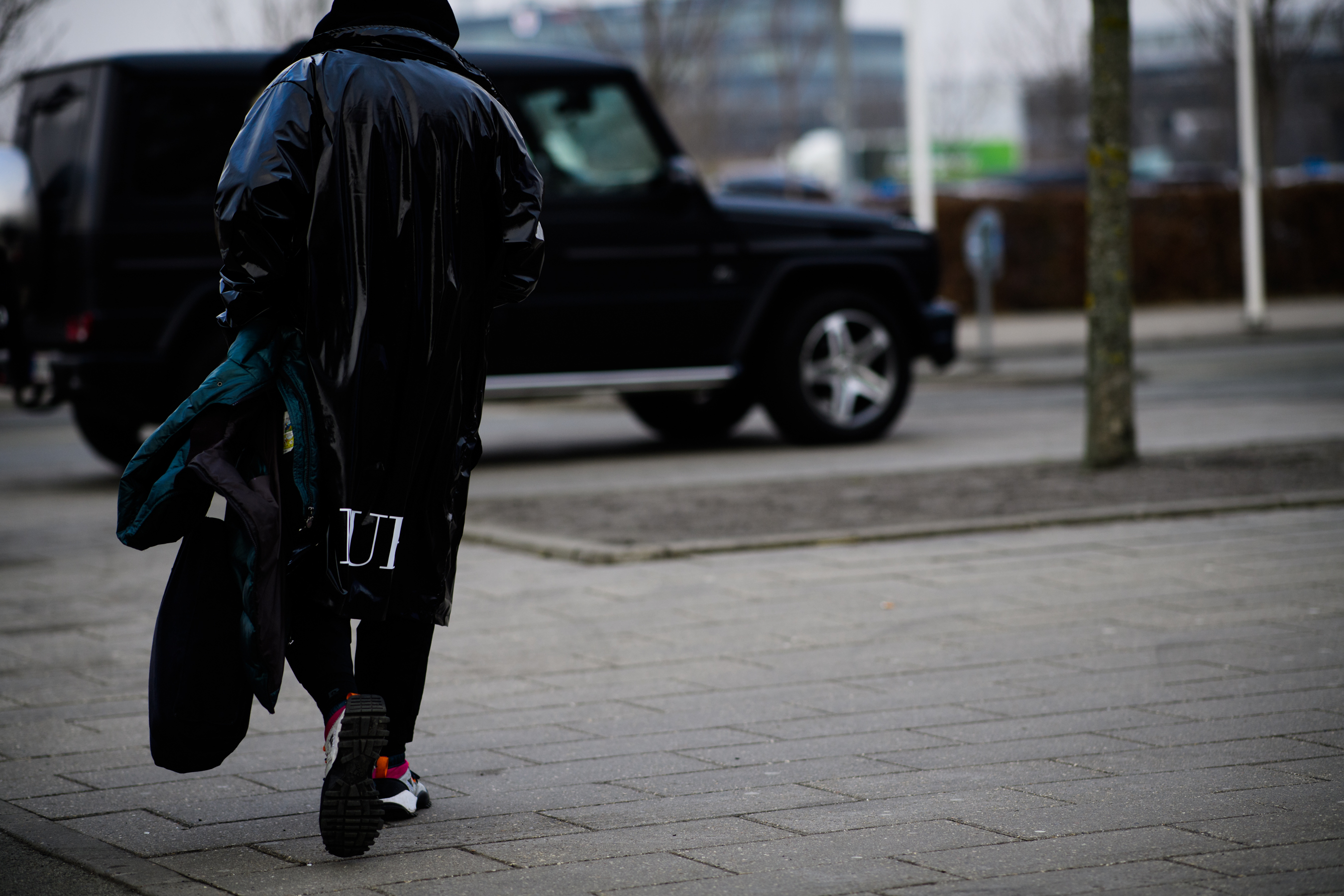 Man with green jacket