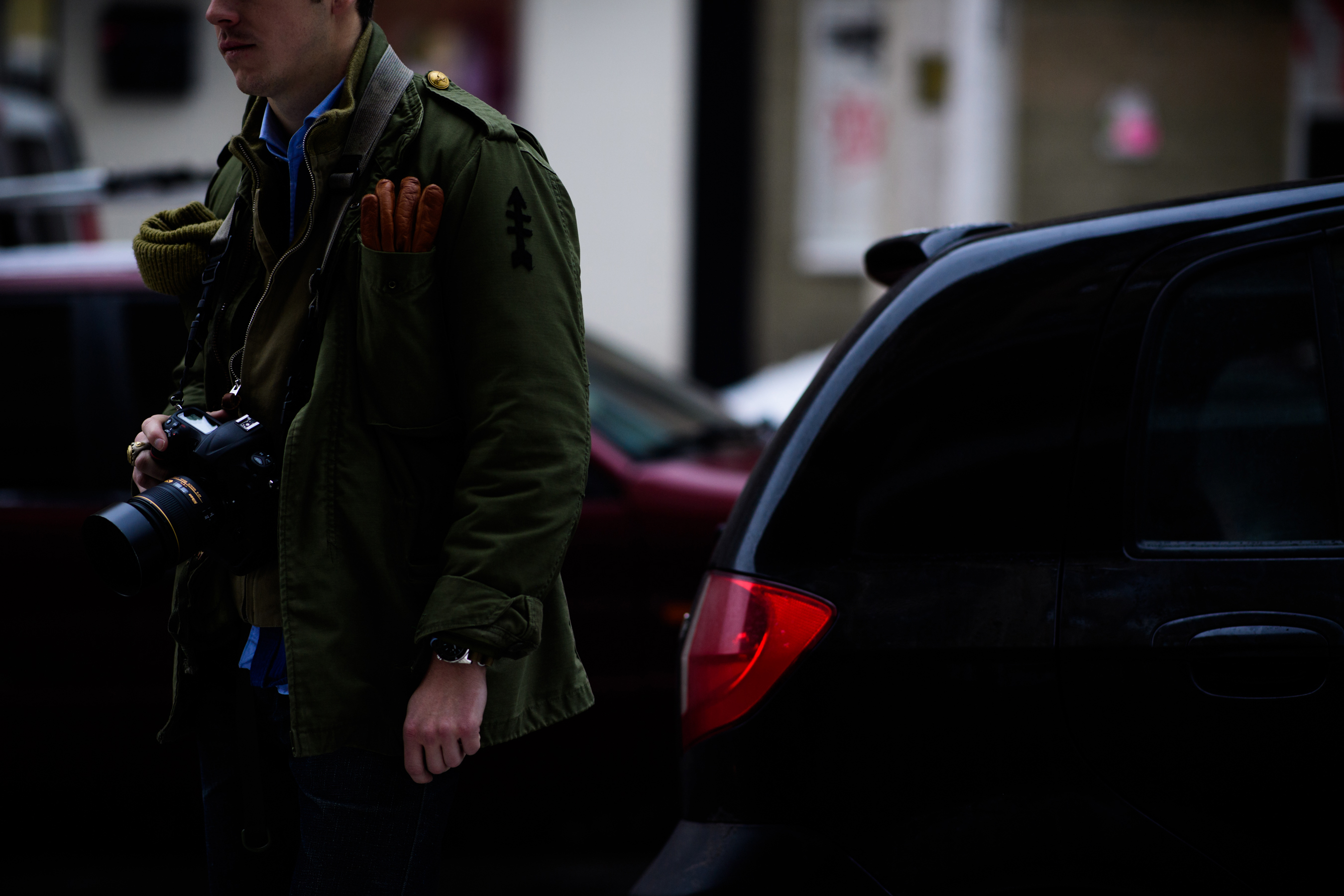 Photographer wearing green clothes
