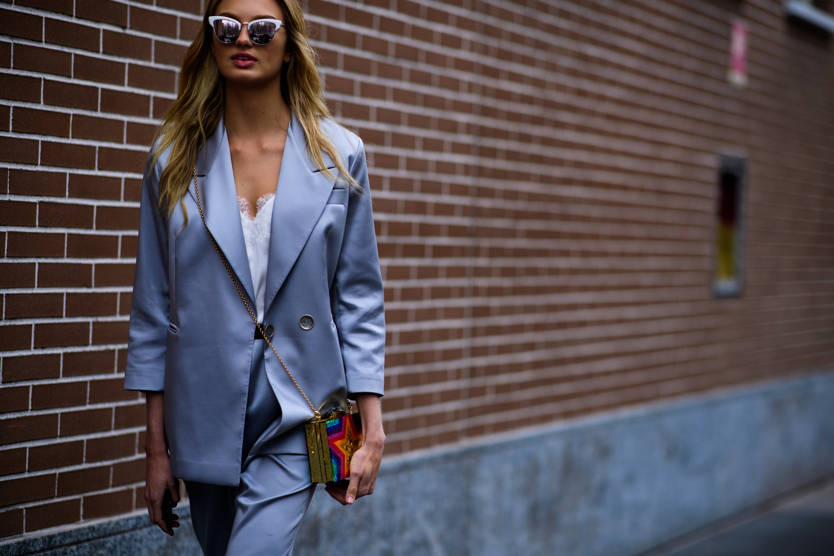 Model wearing brown suit