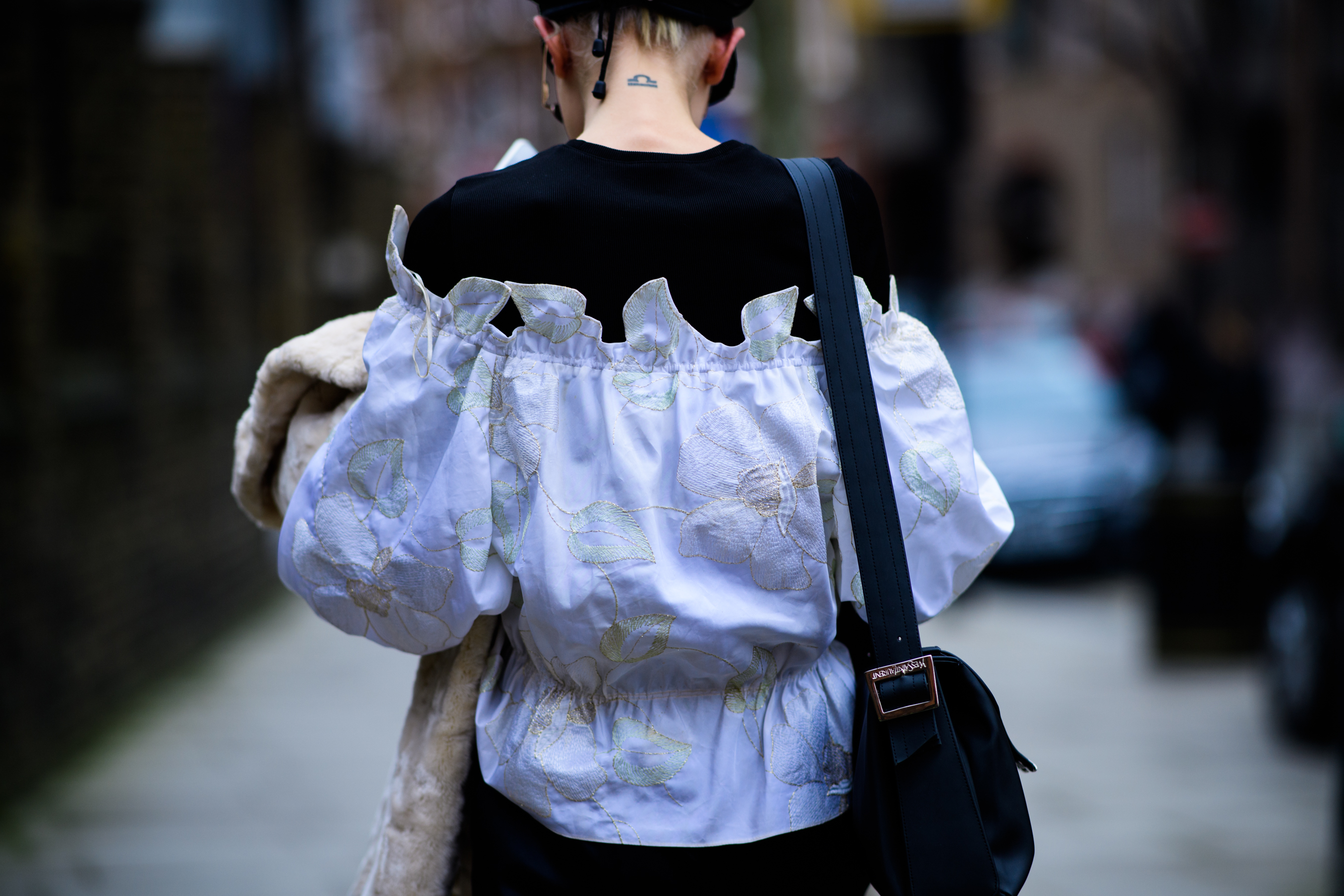 Australian model wearing white shirt