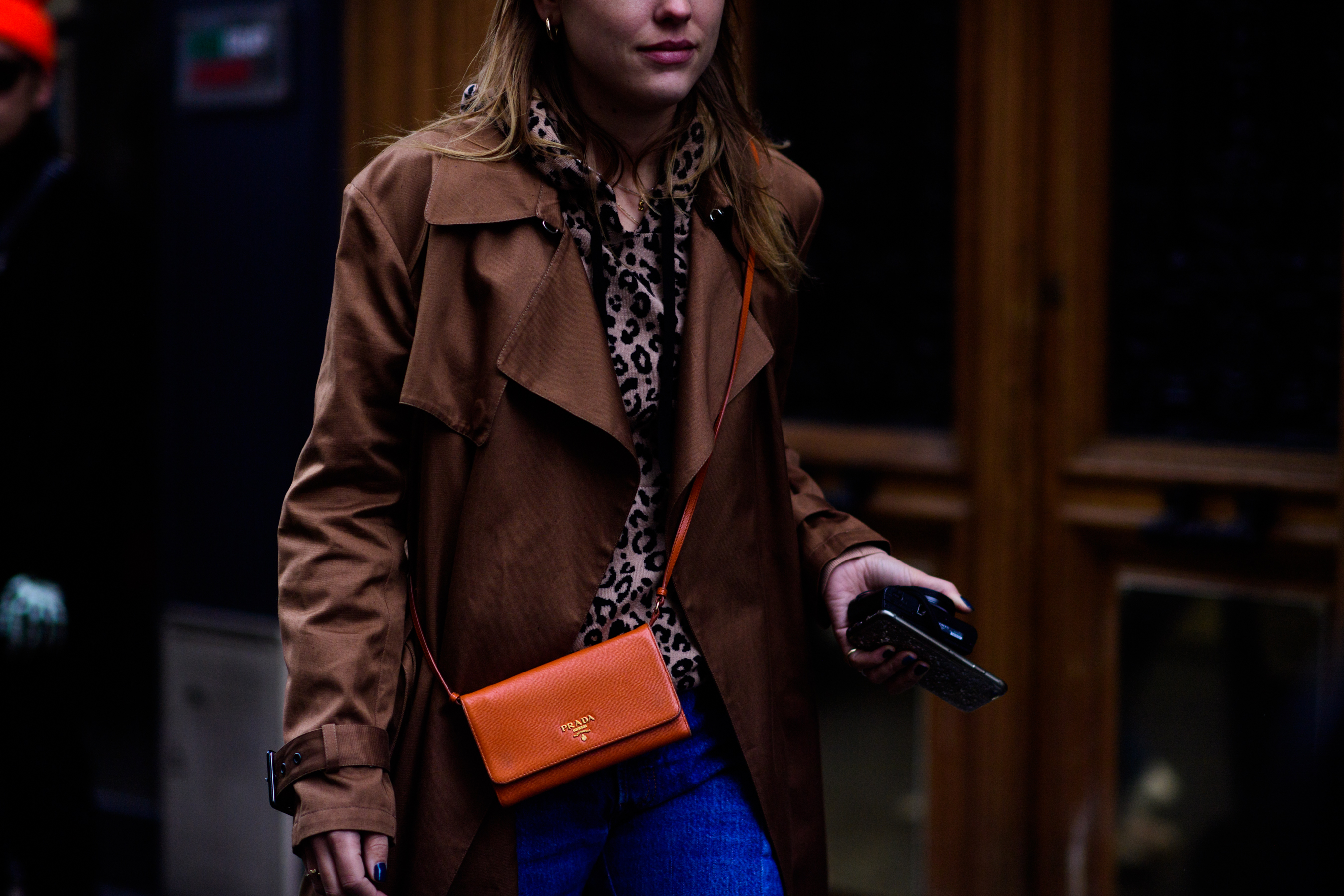 Woman wearing brown trench coat
