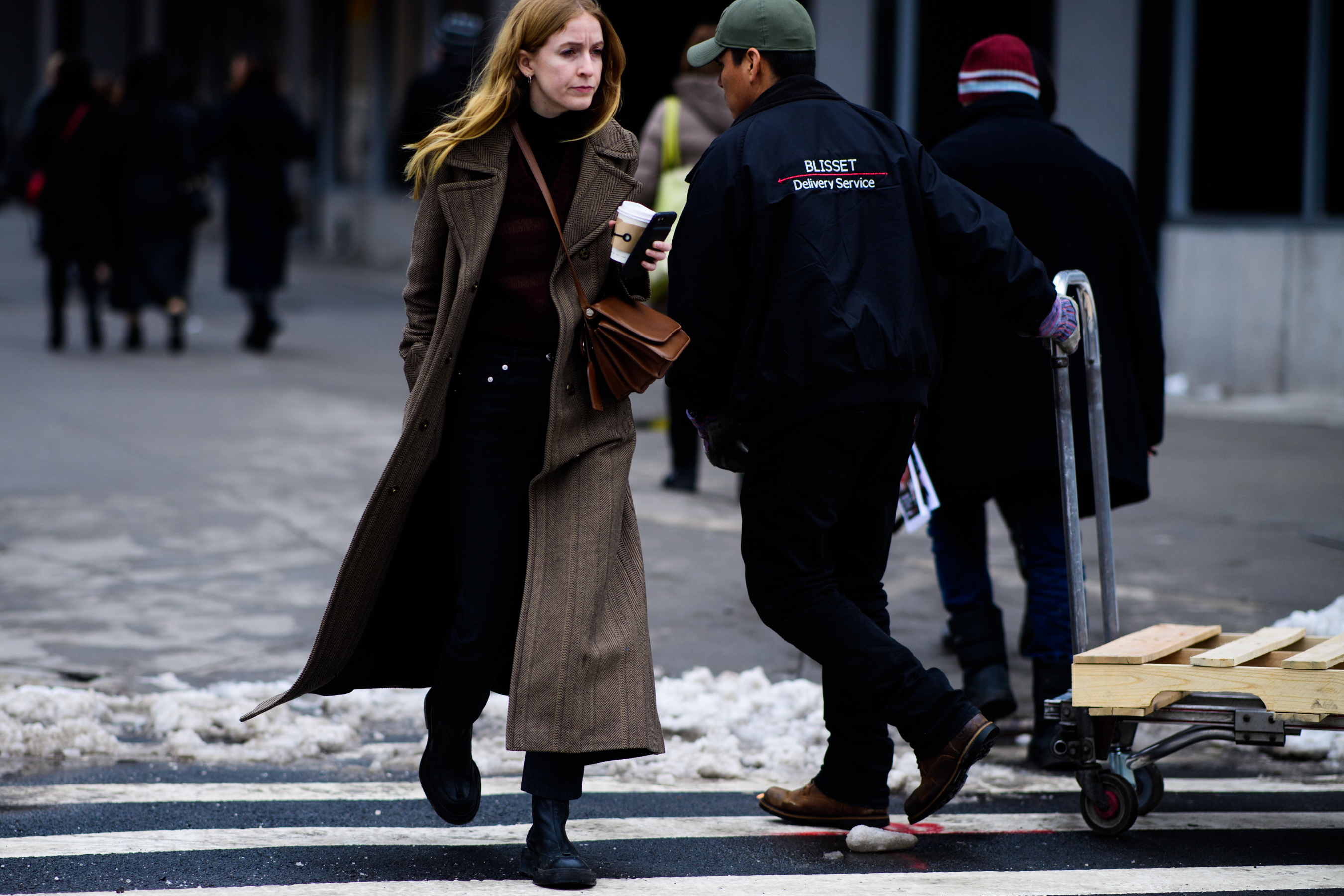 Woman wearing brown coat
