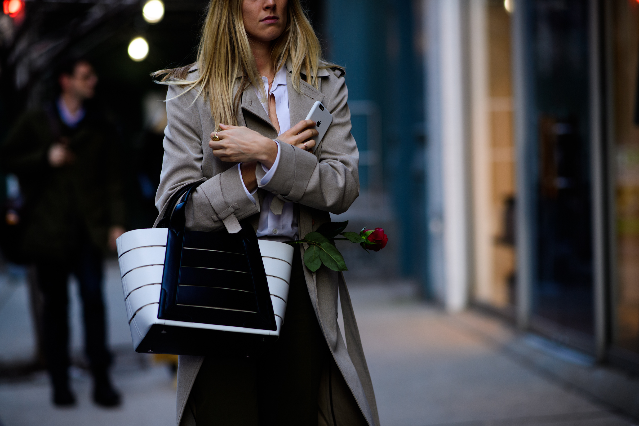 Woman wearing black and white bag
