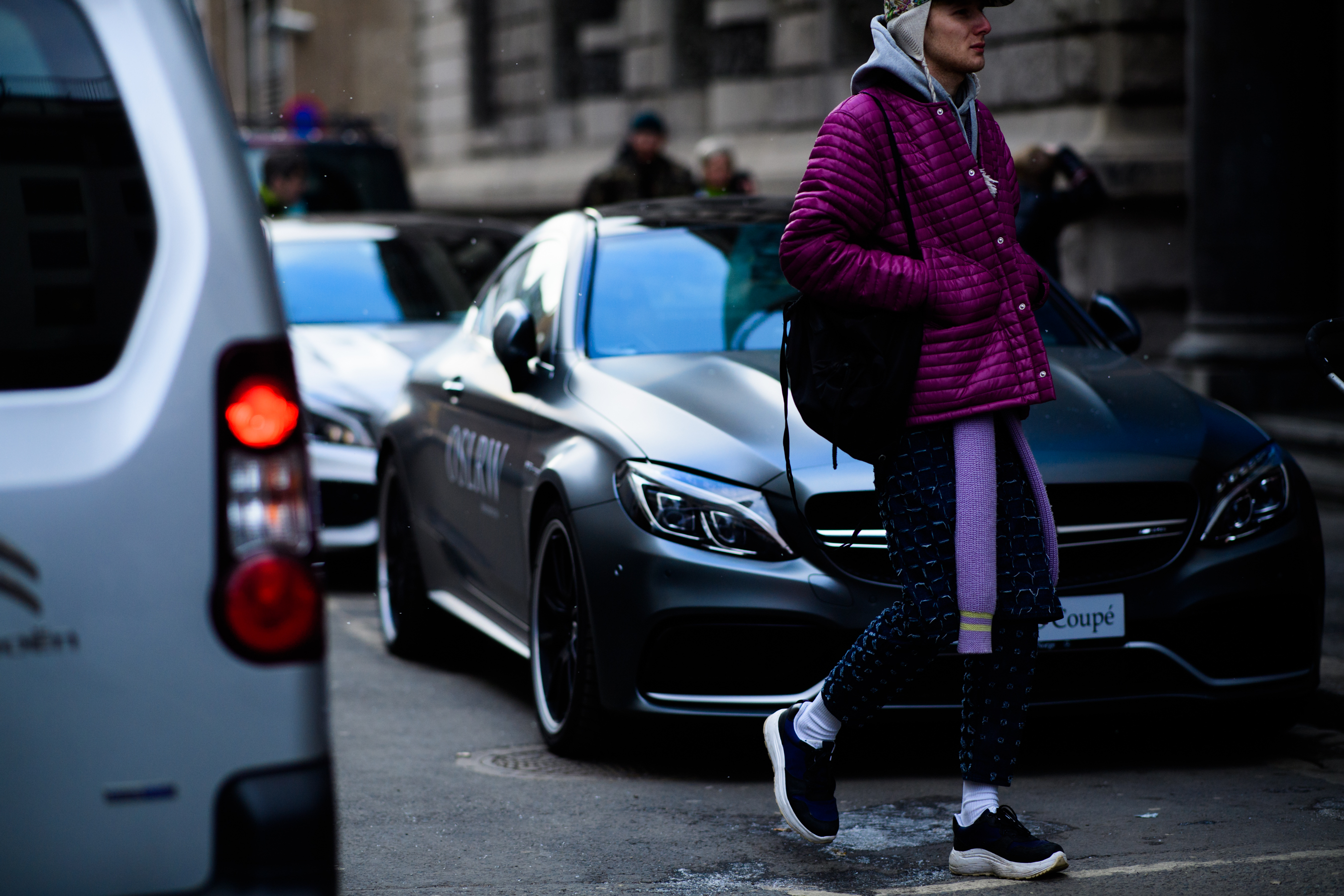 Man wearing violet jacket