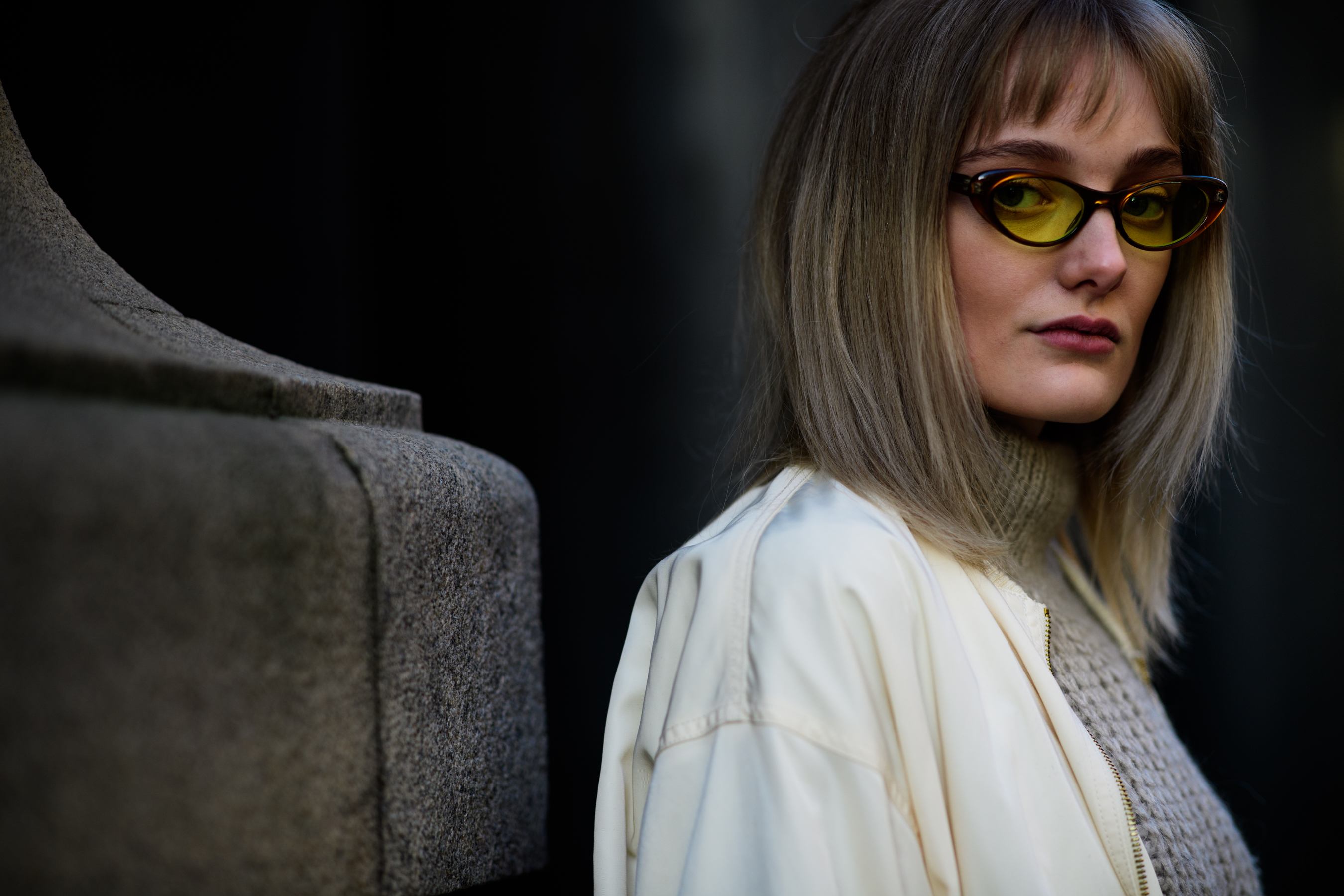 Woman wearing yellow glasses