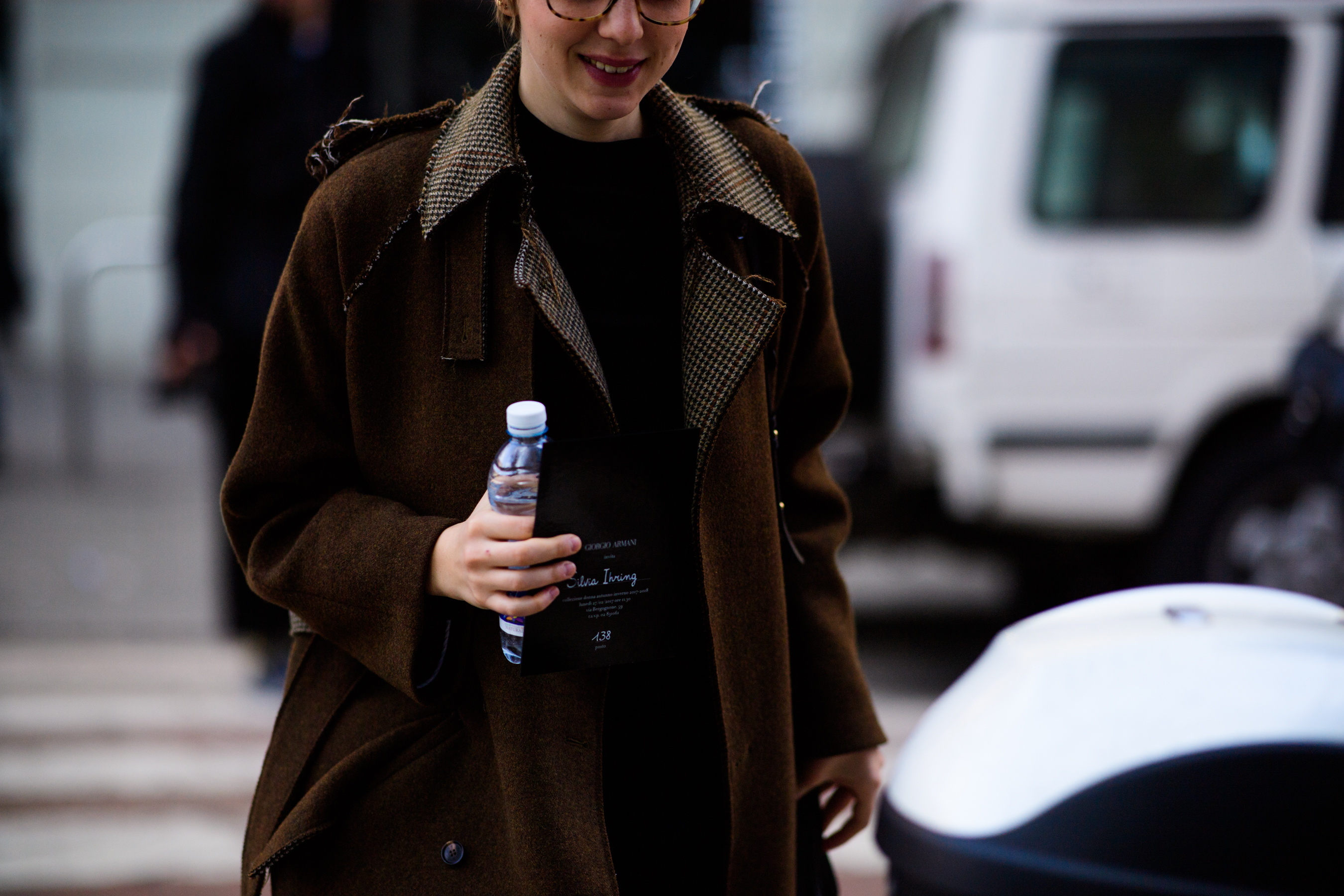 Woman wearing brown coat