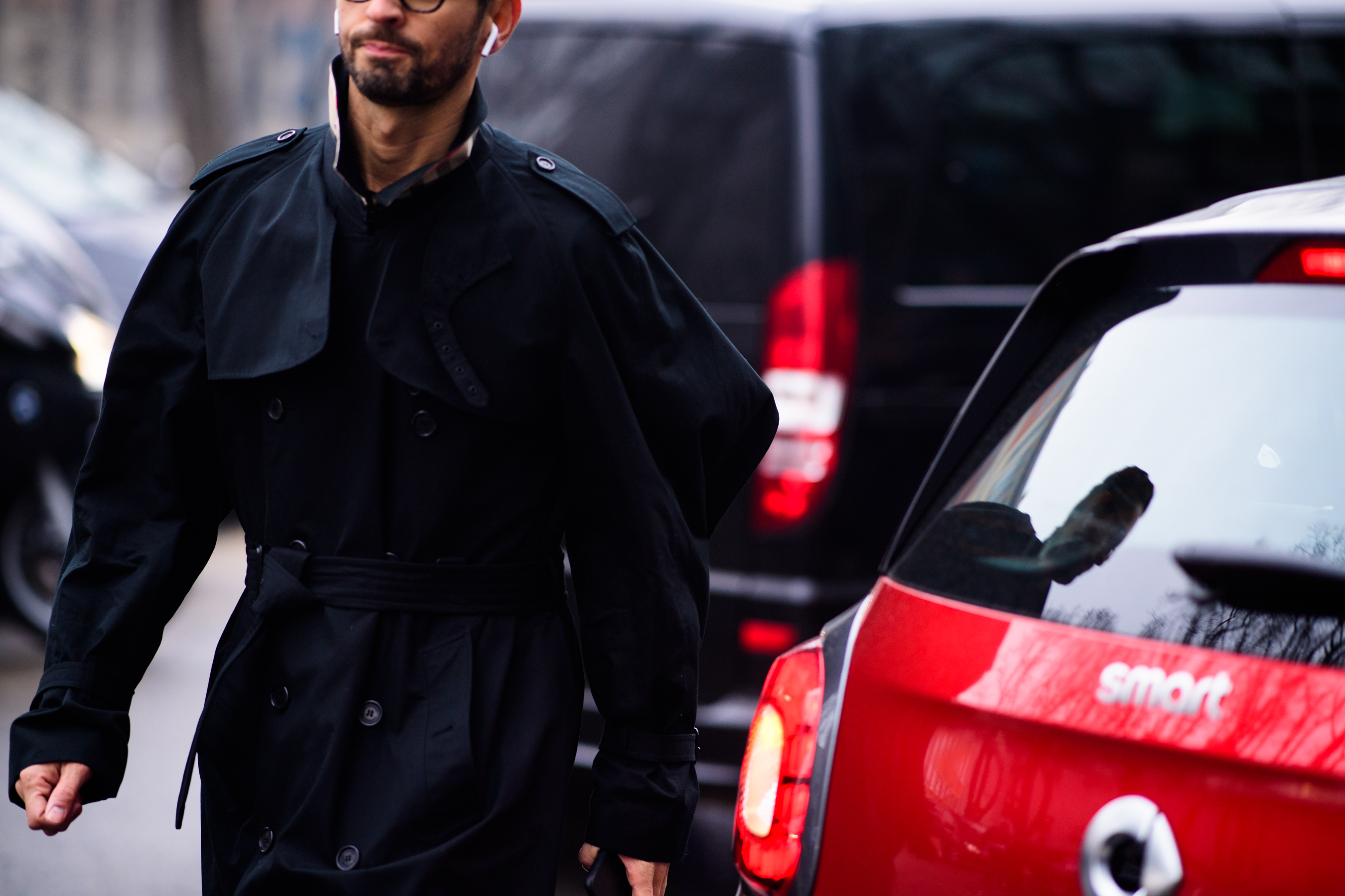Editor wearing black cloak