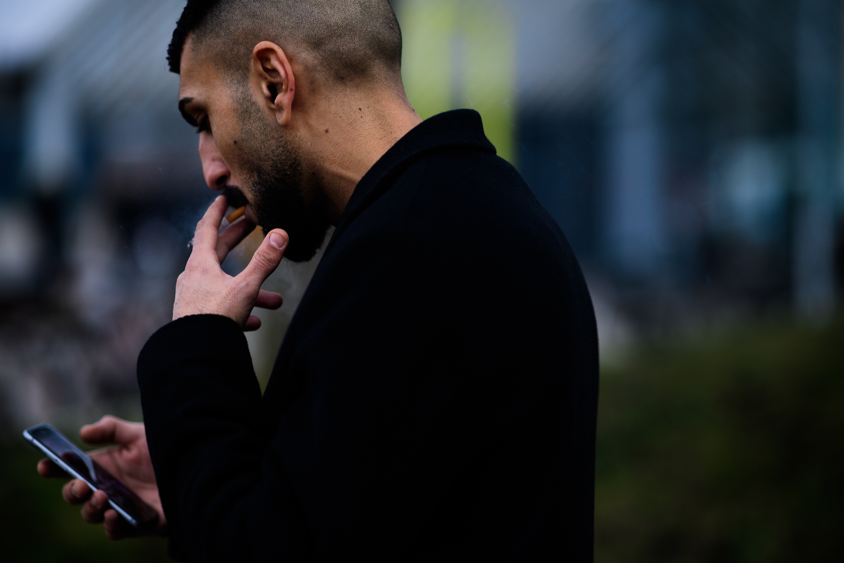 Man wearing black coat