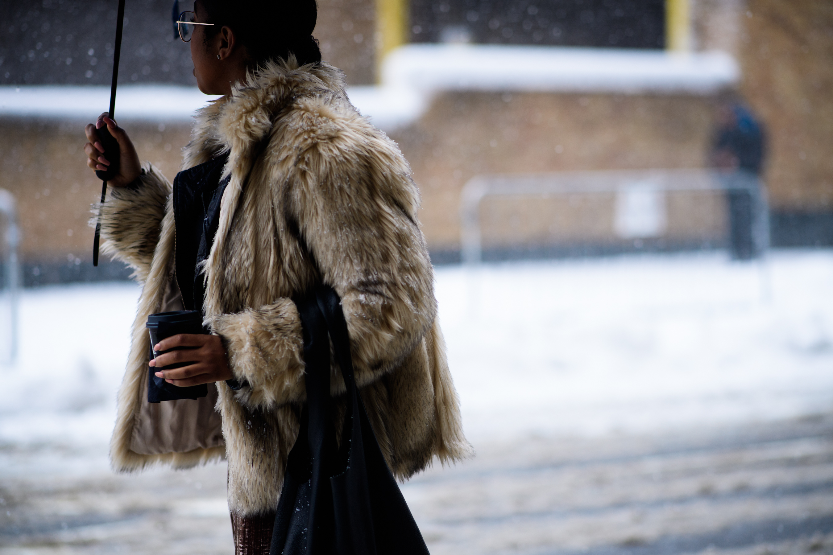 Woman wearing fur jacket