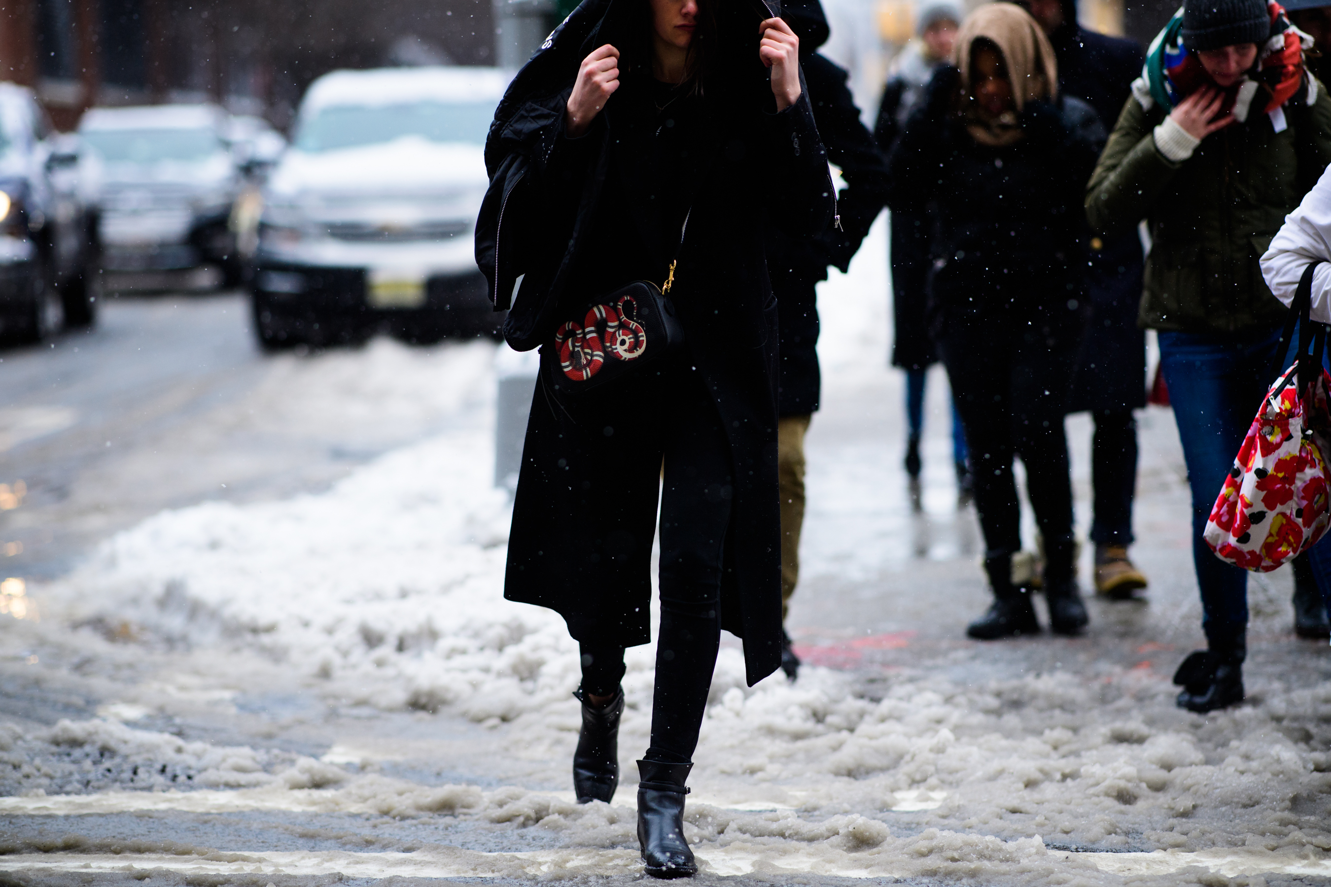 Woman wearing Gucci handbag