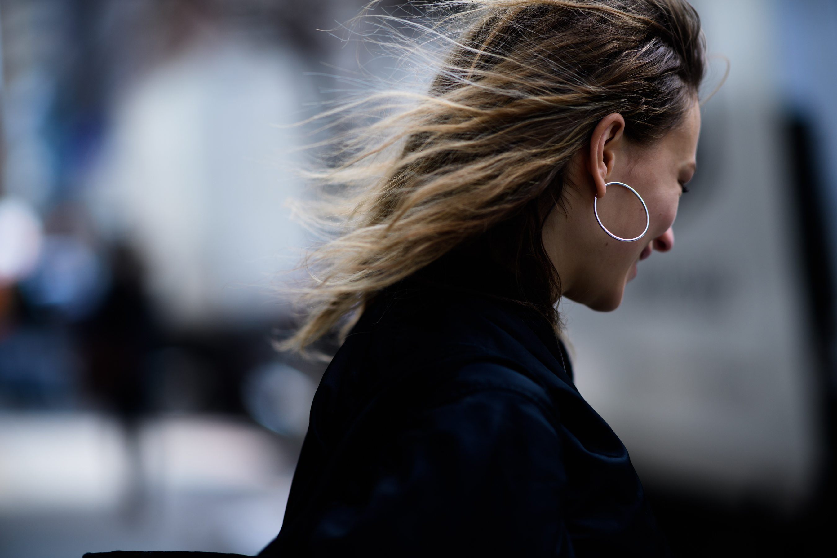 Model wearing silver earring
