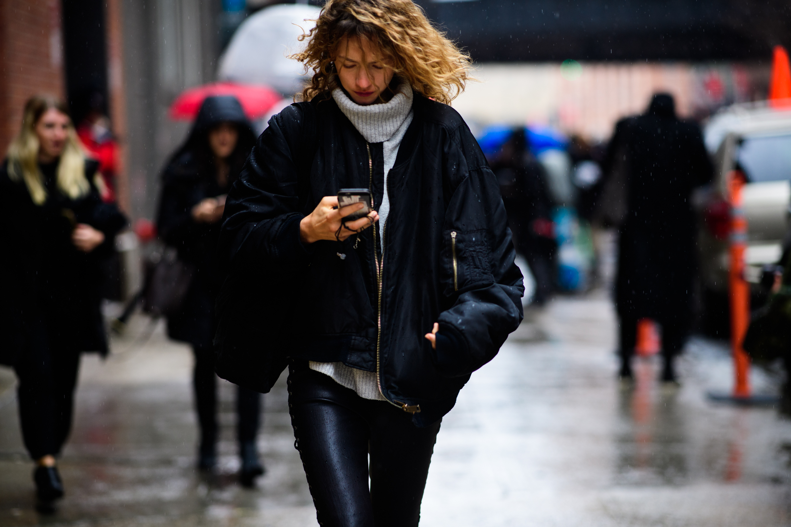 Model wearing black oversized bomber