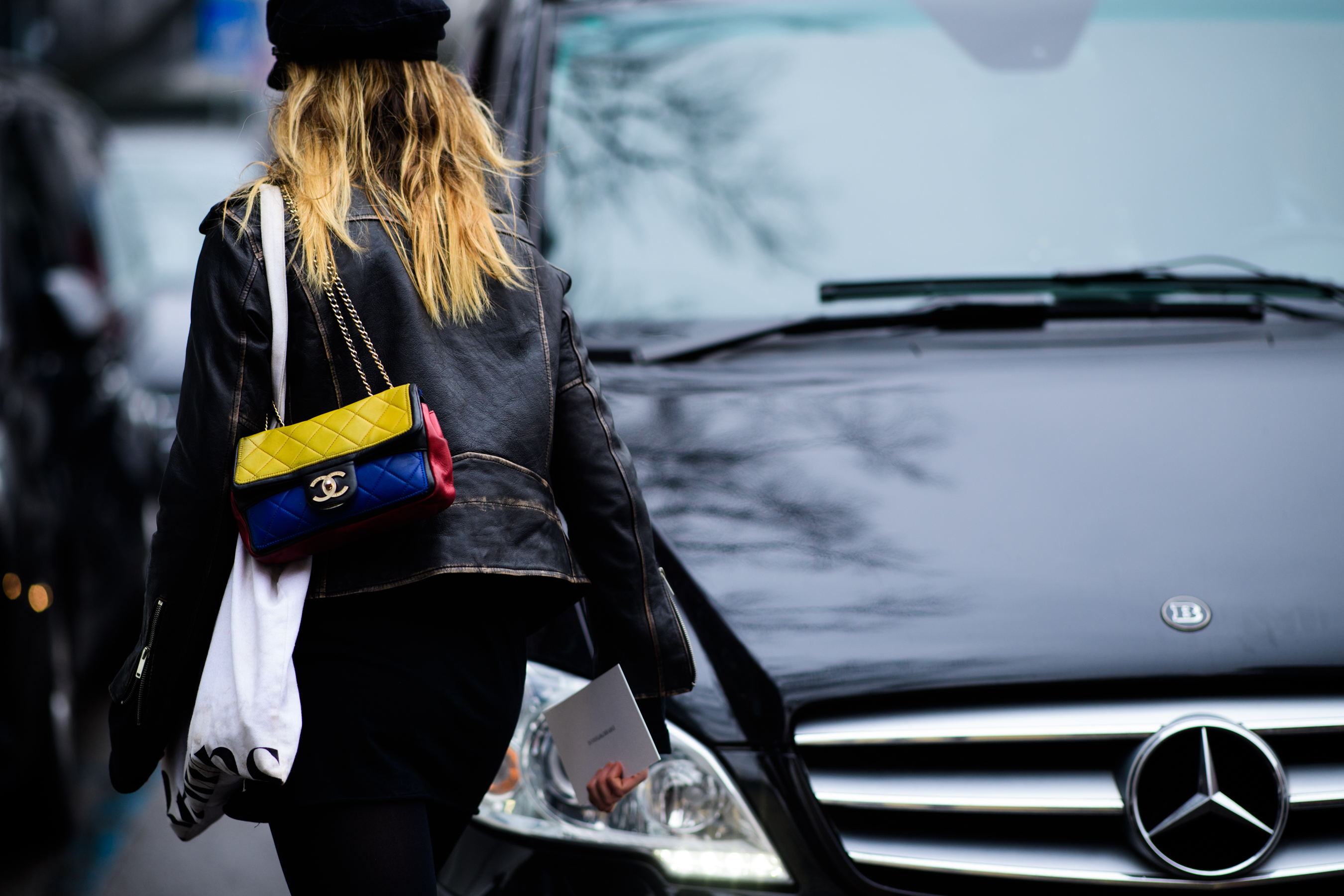 Woman wearing Chanel bag