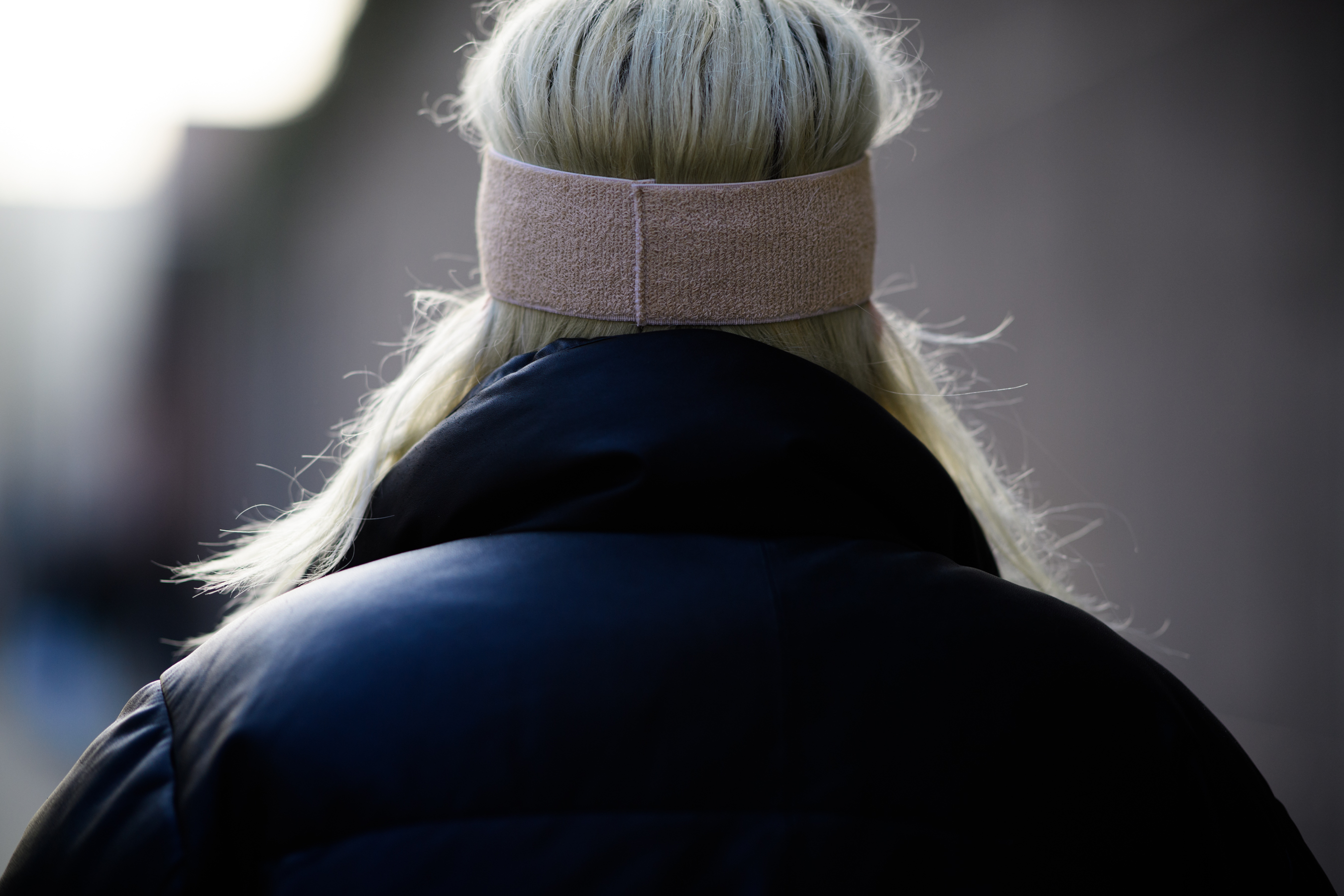 Model wearing Gucci accessory