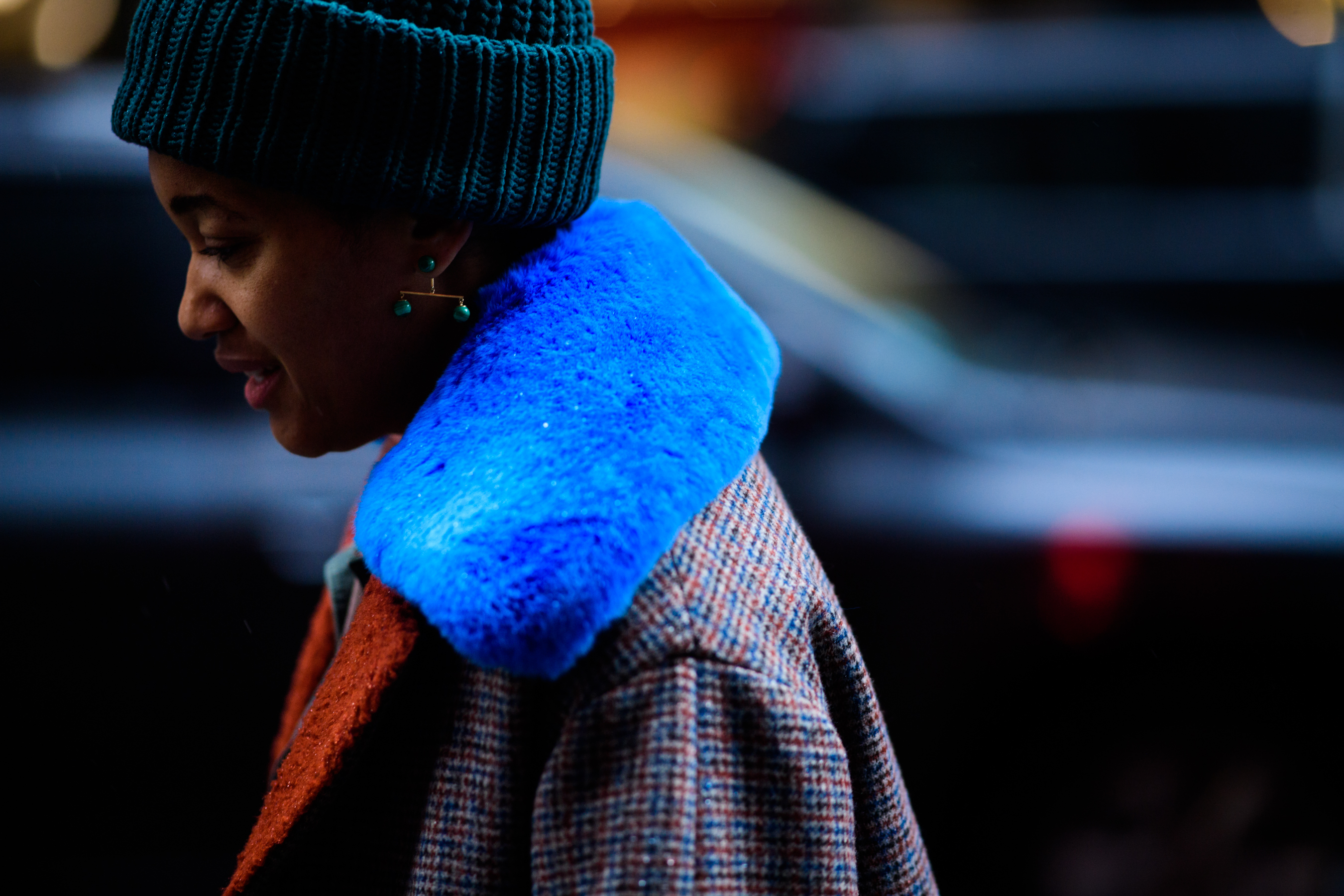 American photographer wearing blue beanie