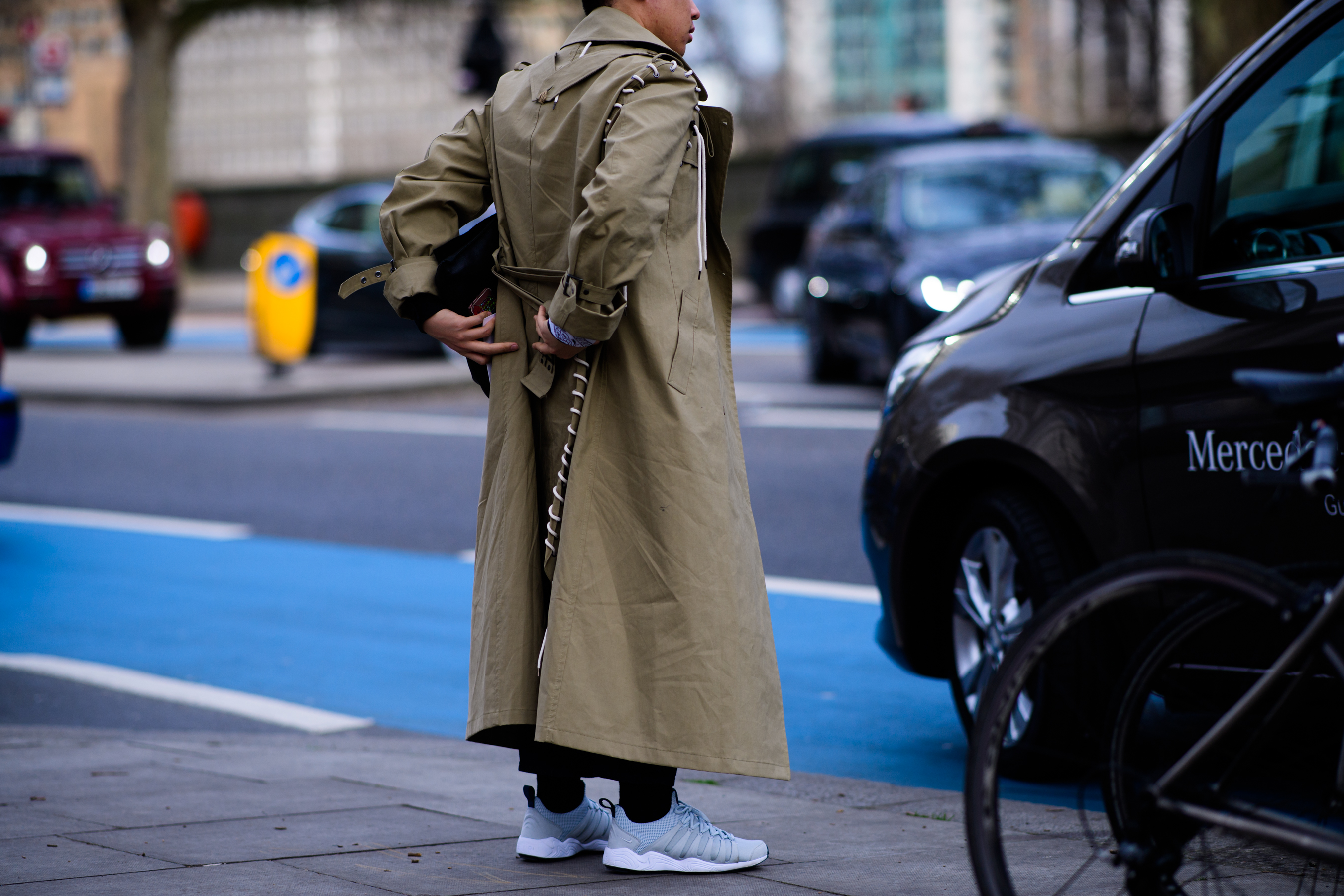 Chinese man wearing Craig Green coat