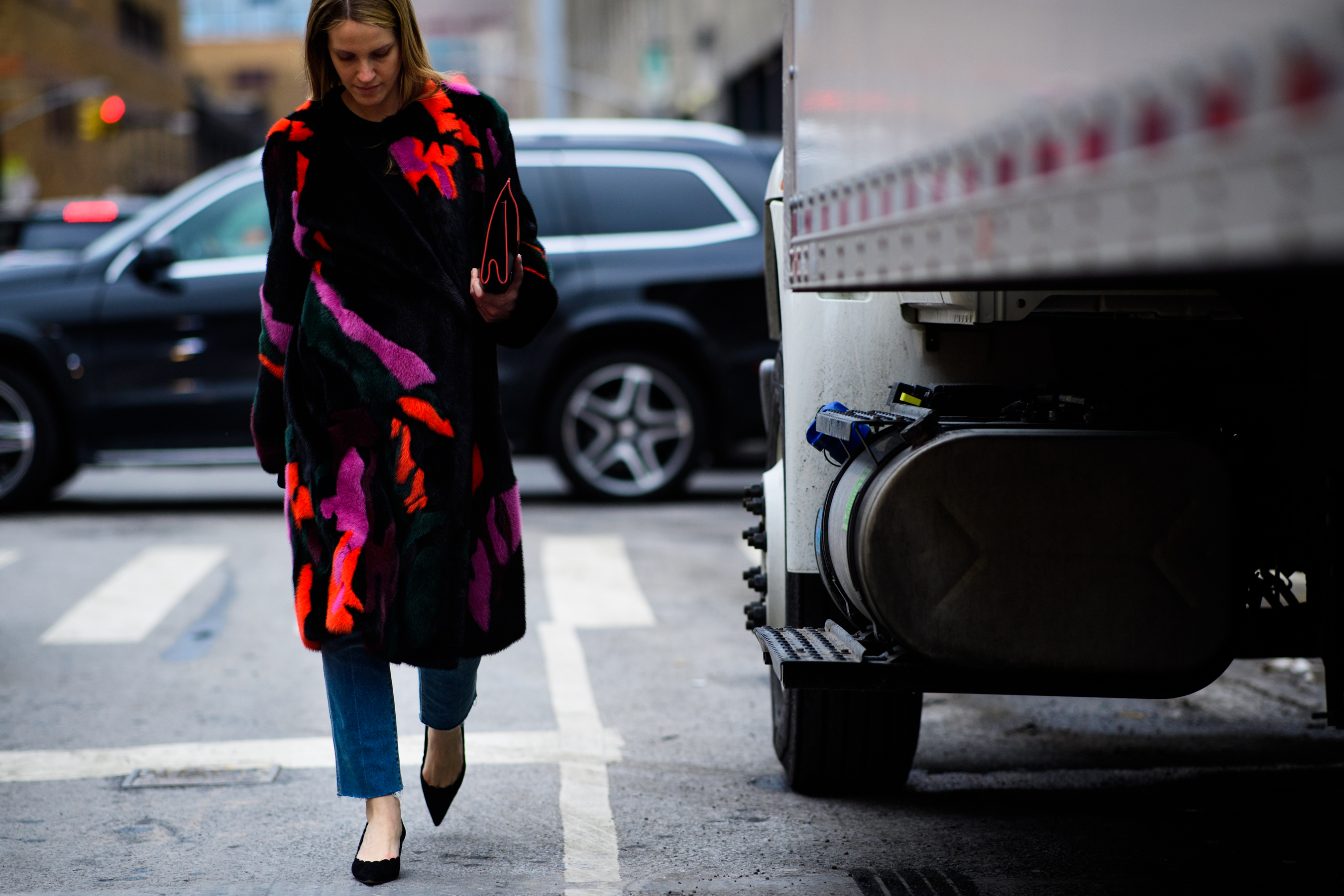 Woman wearing long fur coat