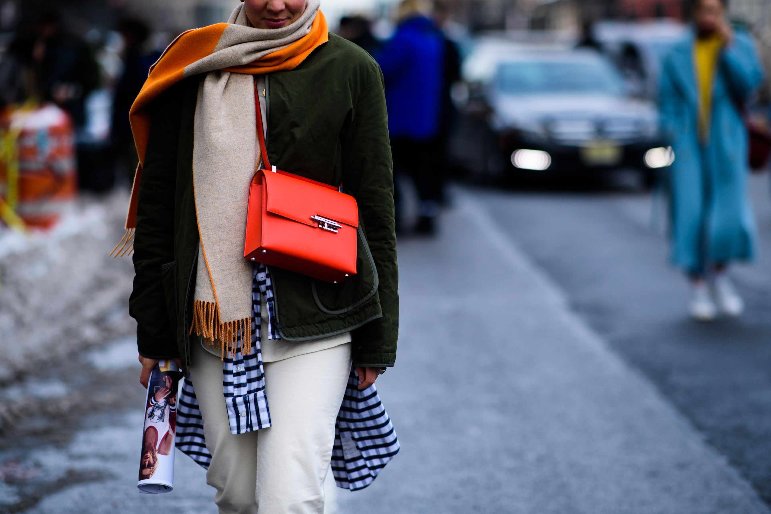 Woman wearing green jacket