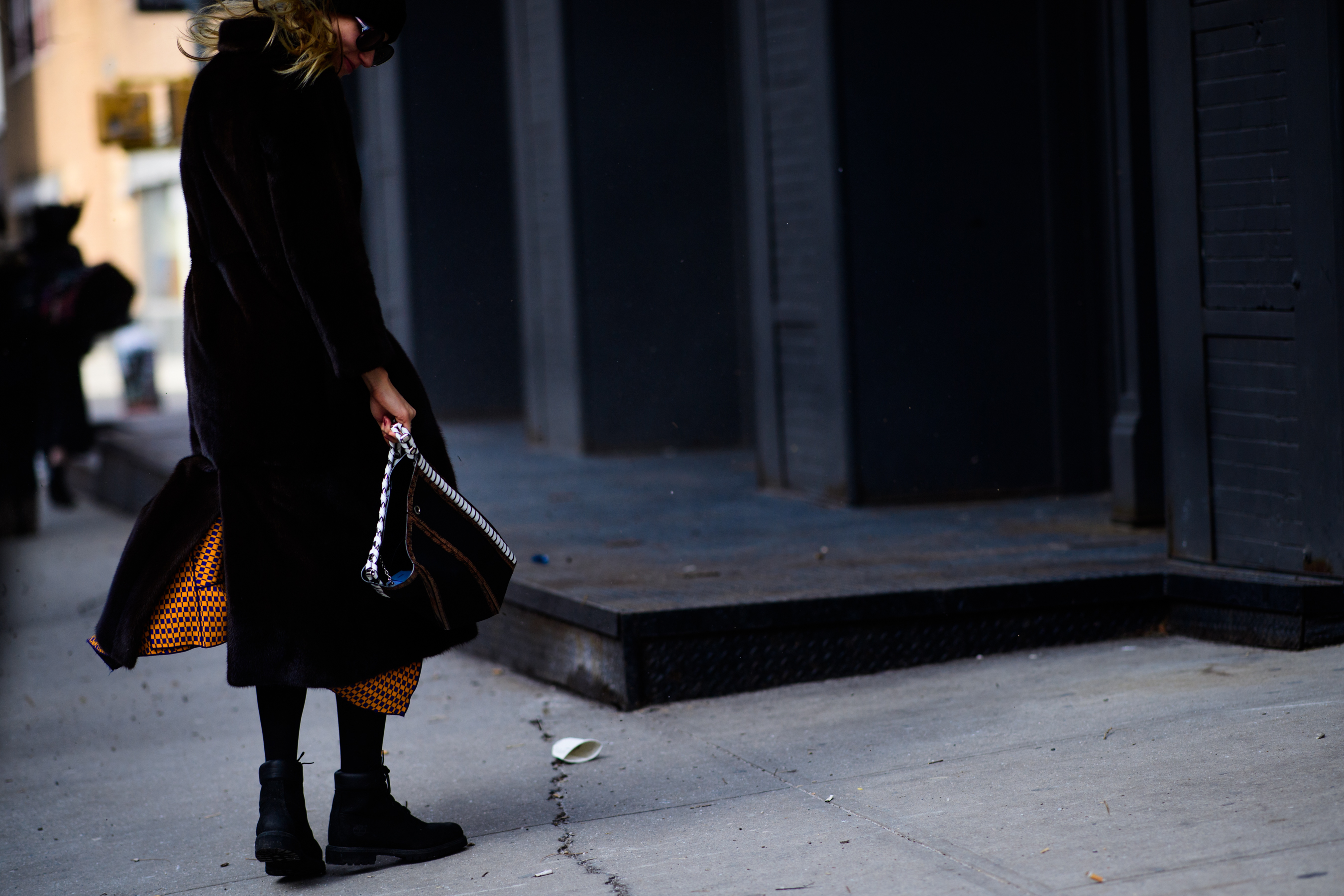 German buyer wearing long fur coat