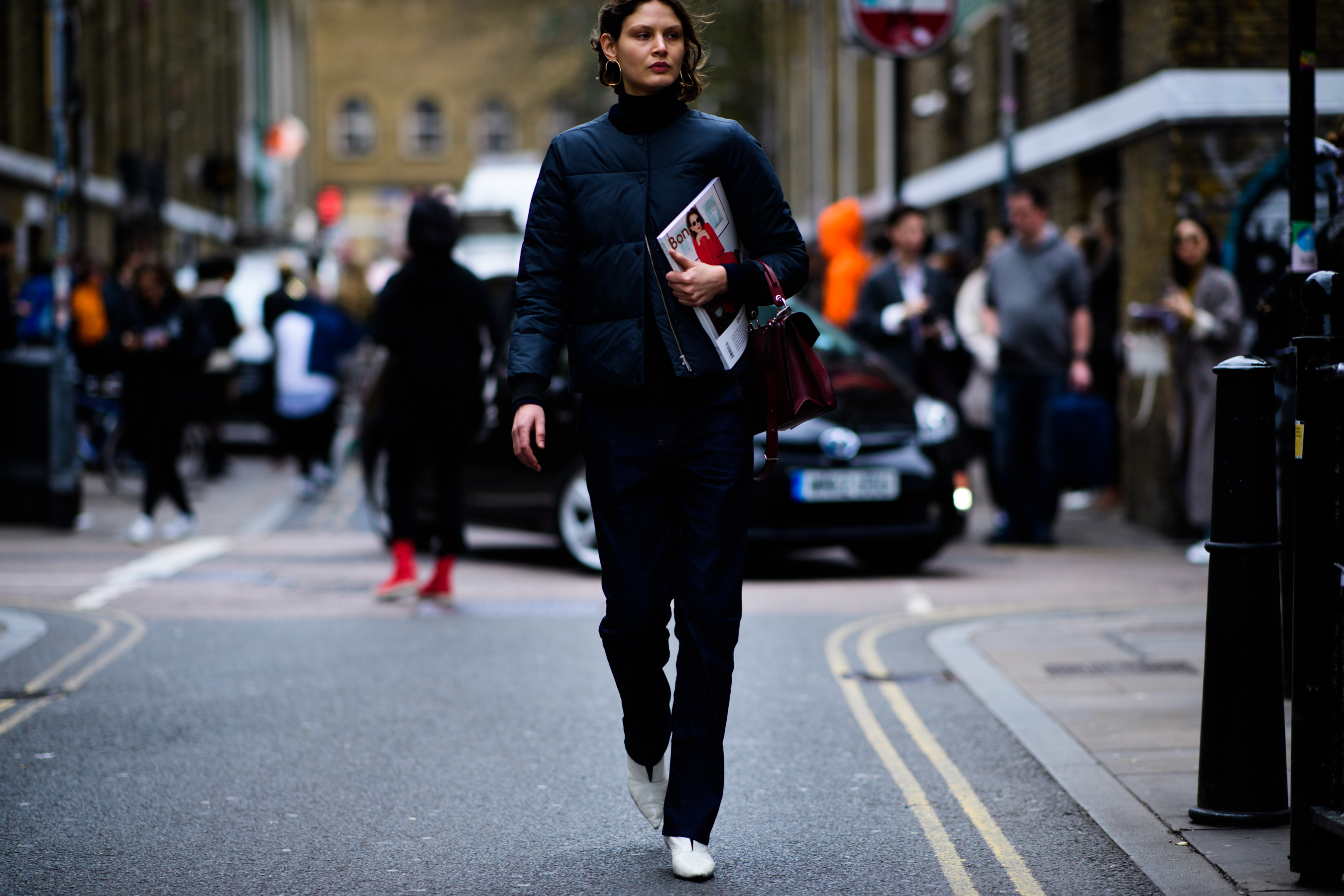 Woman wearing blue puffer jacket