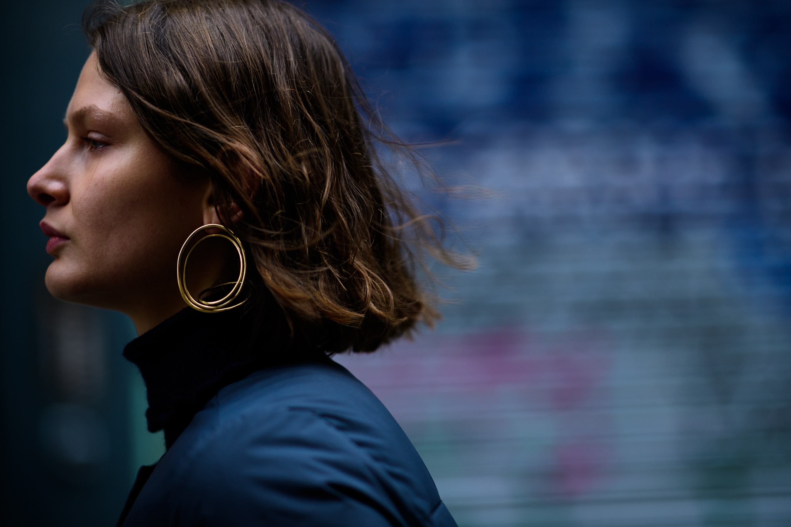 Woman wearing blue puffer jacket