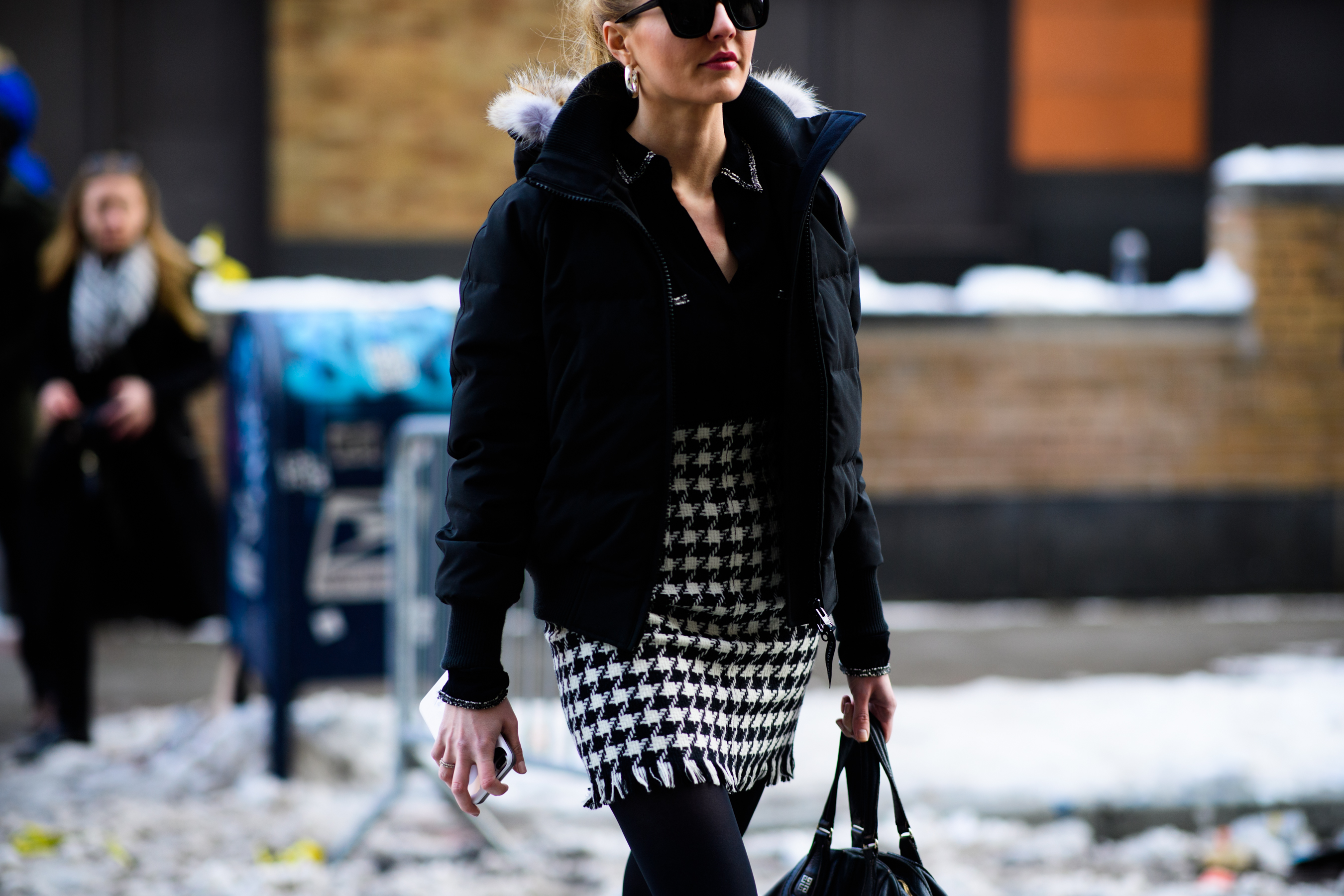 Woman wearing black sunglasses