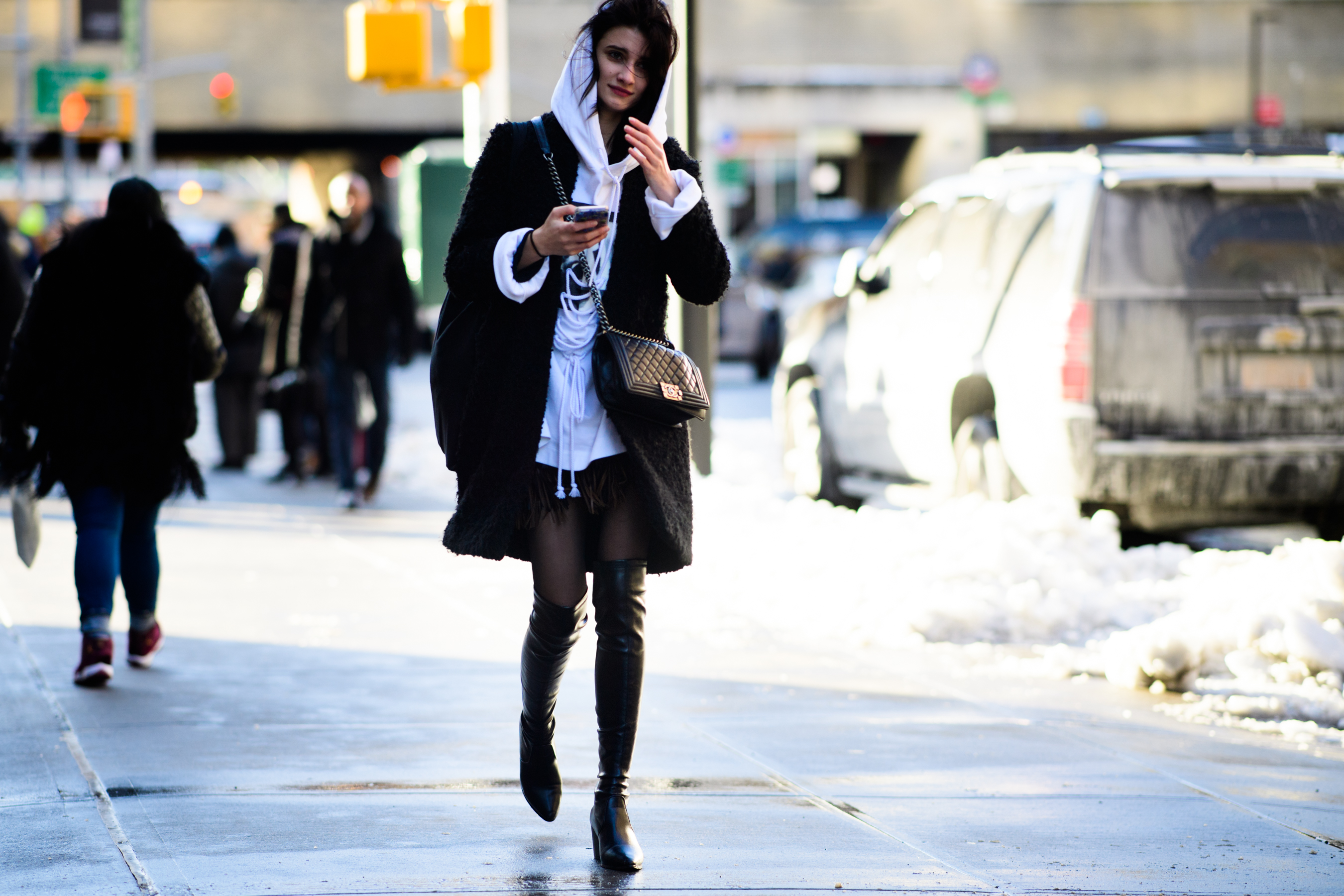 Woman wearing white hoodie