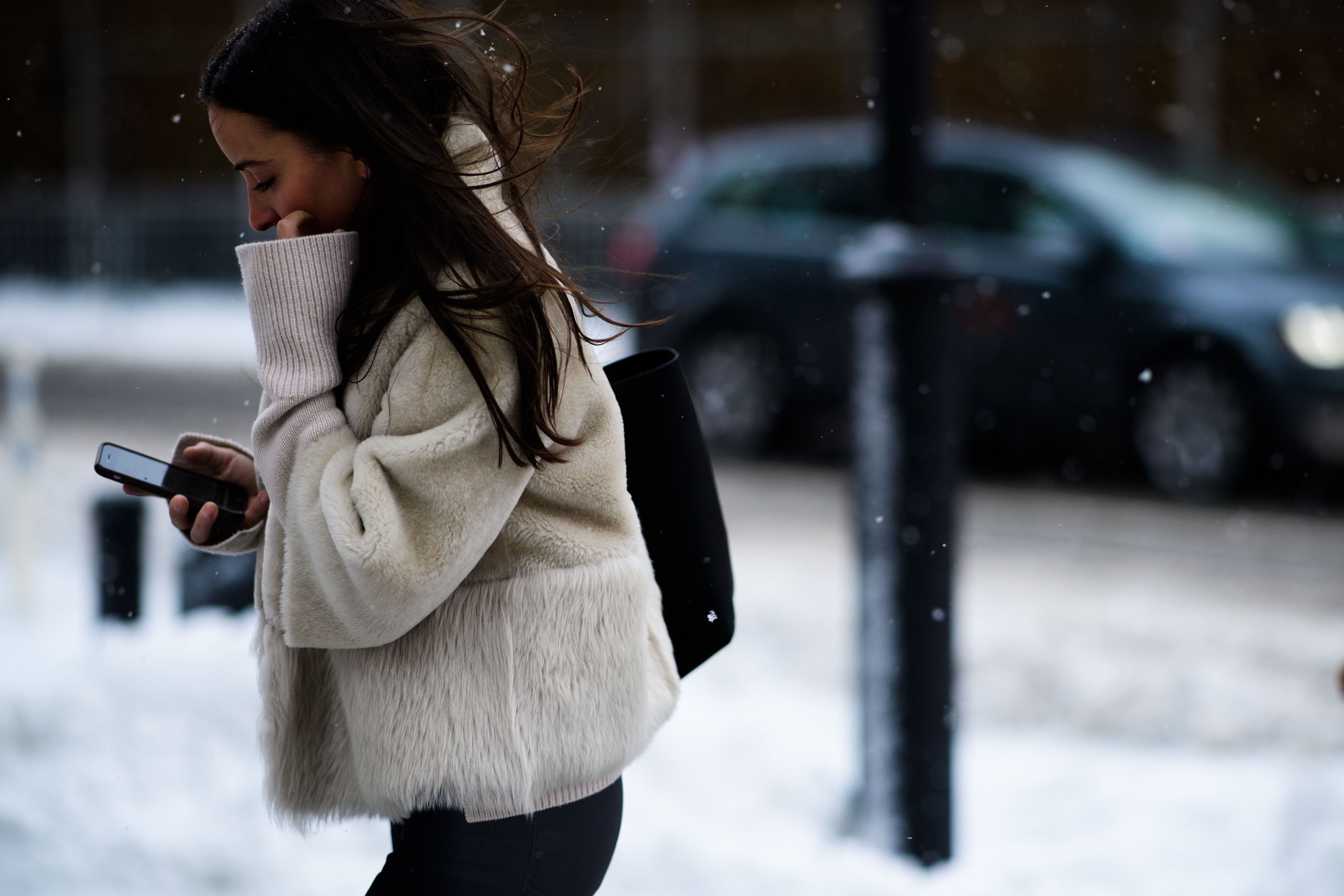 Woman wearing fur jacket
