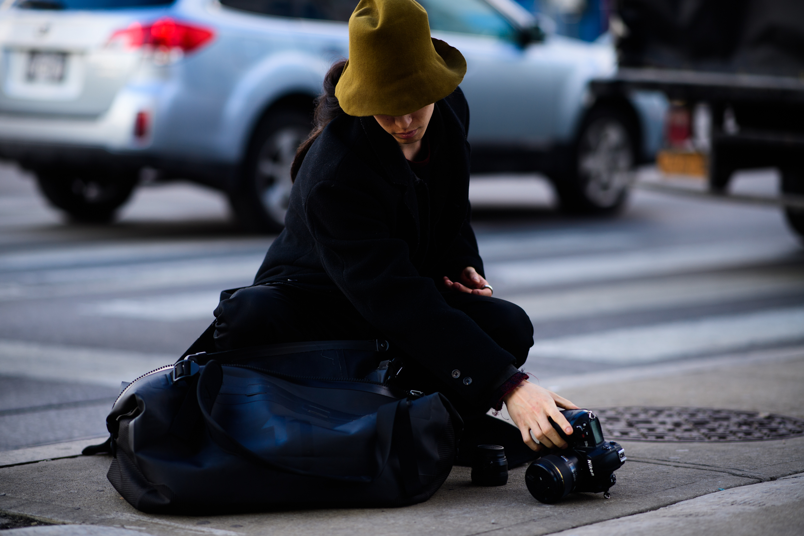Photographer wearing black clothes