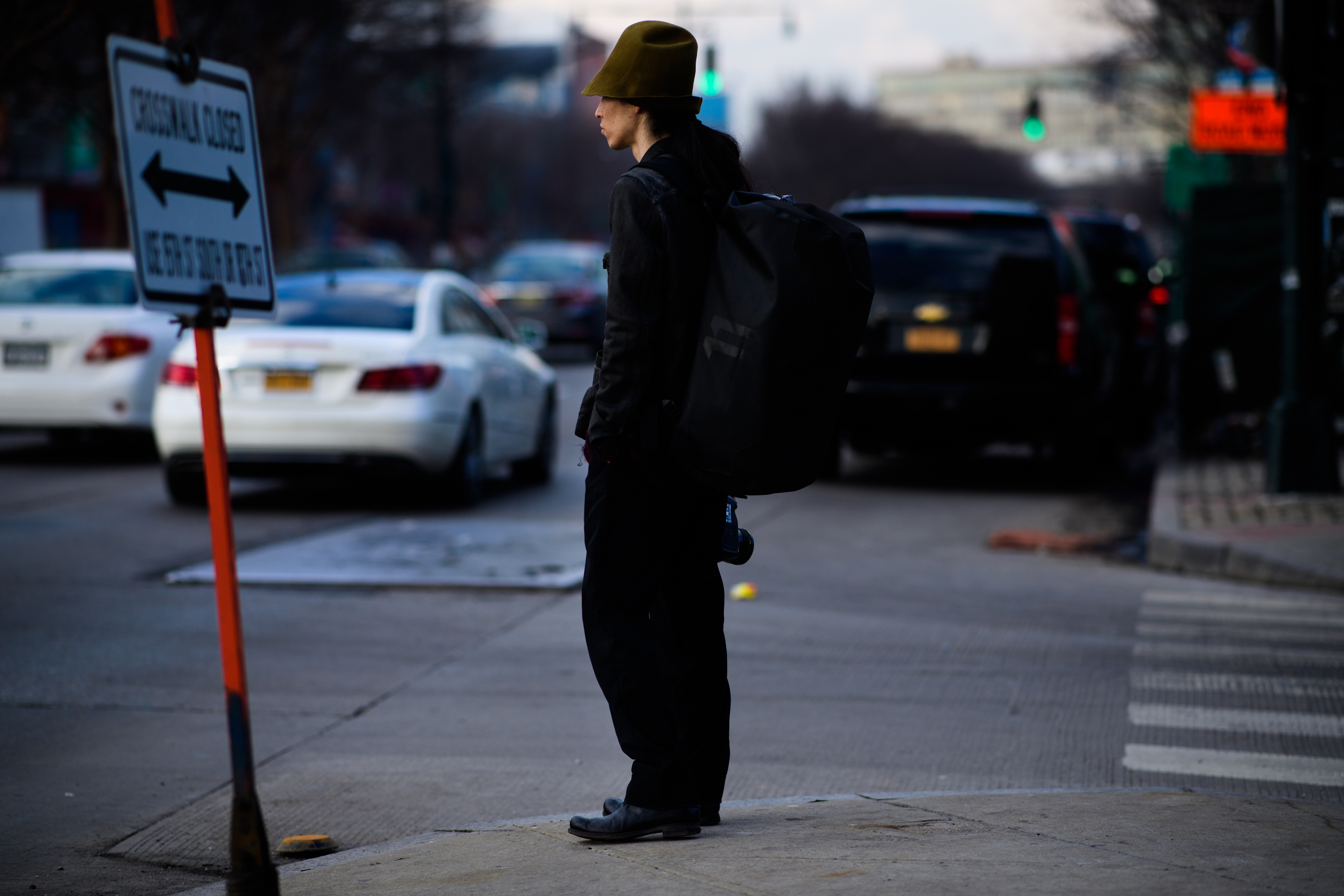 Photographer wearing black clothes