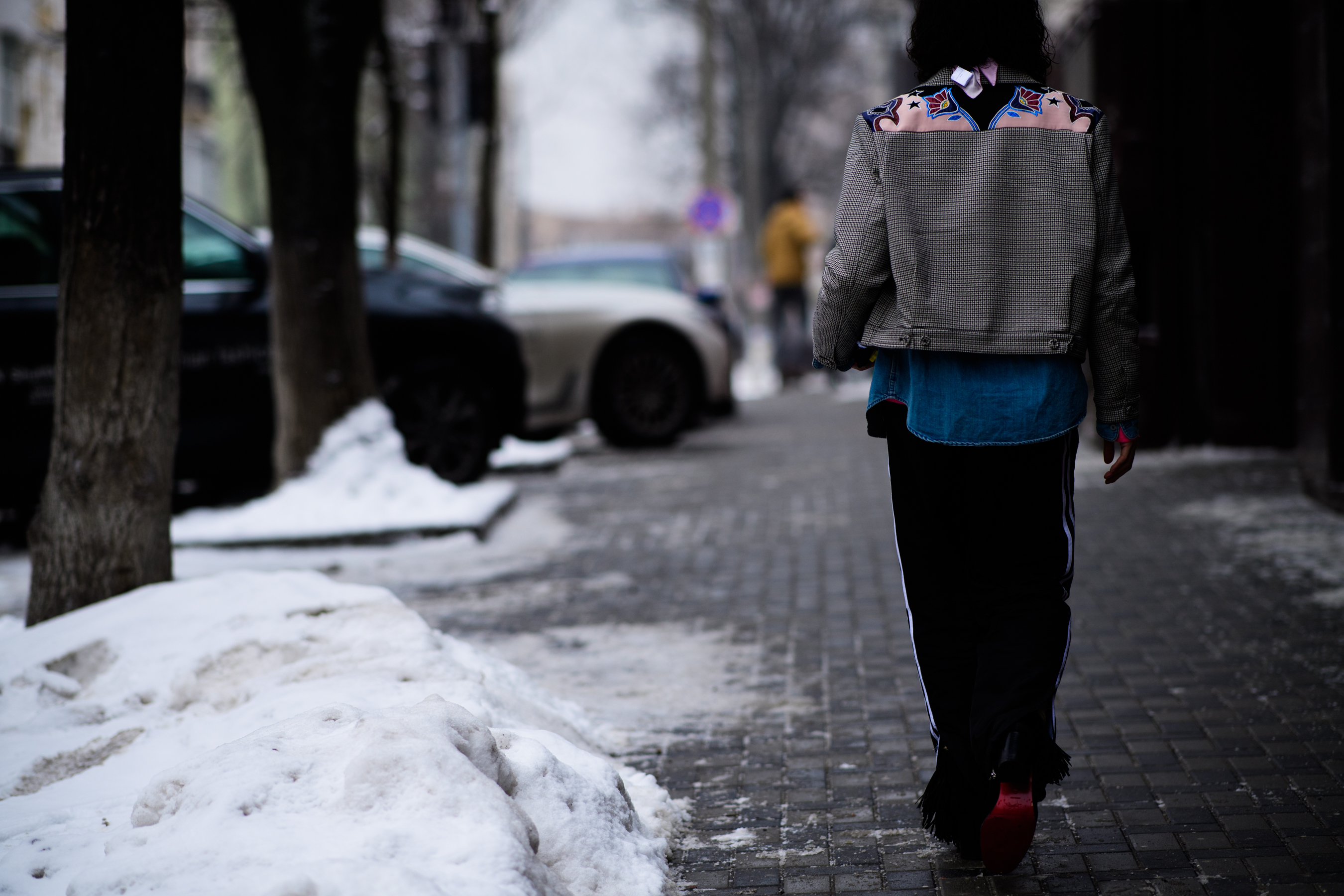 Man wearing adidas pants