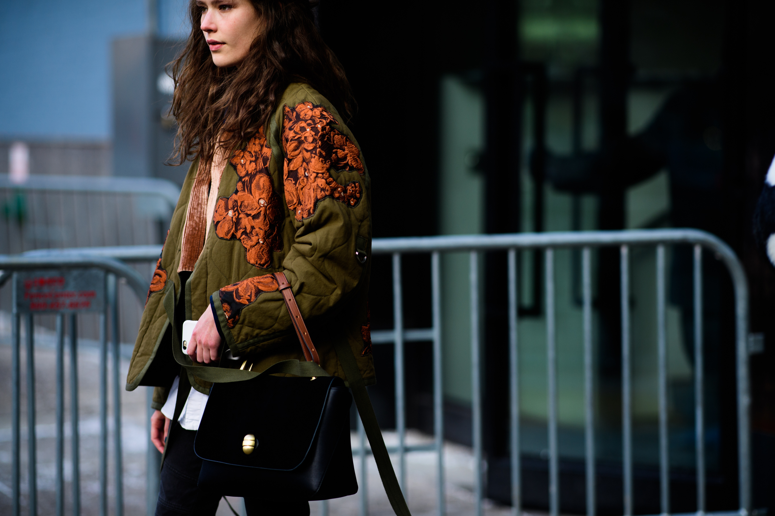 French model wearing green parka